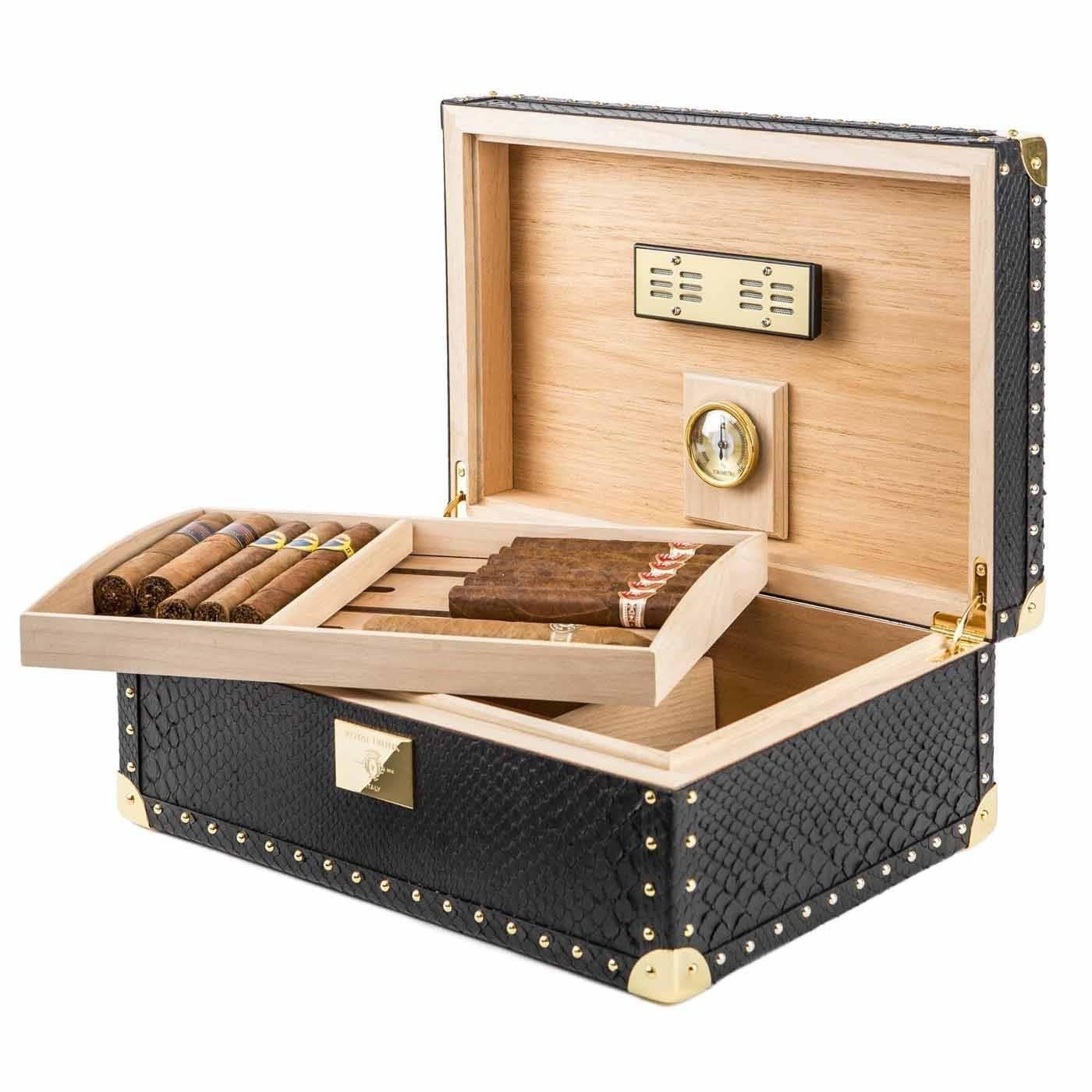 This superb humidor case can store up to about 70 cigars. Its internal structure is in Spanish cedar wood and it is built according to the most recent standards with a highly-precise humidification system. The external cover is in real python skin