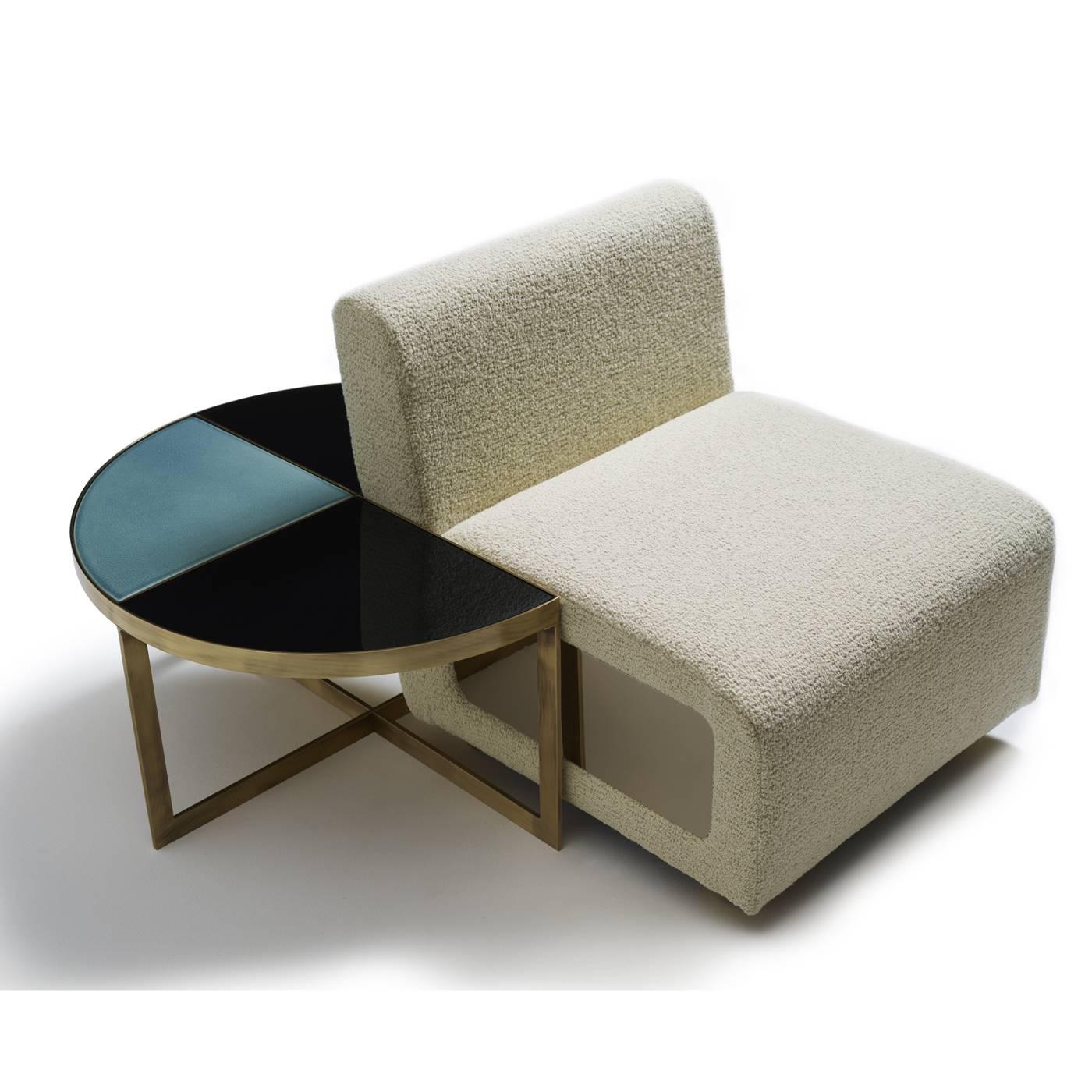 This charming coffee table, designed by Piero Angelo Orecchioni for Marioni, has a round top with one quadrant missing. This unique shape serves a practical storage purpose and allows for the table to be placed up against a couch or another piece of