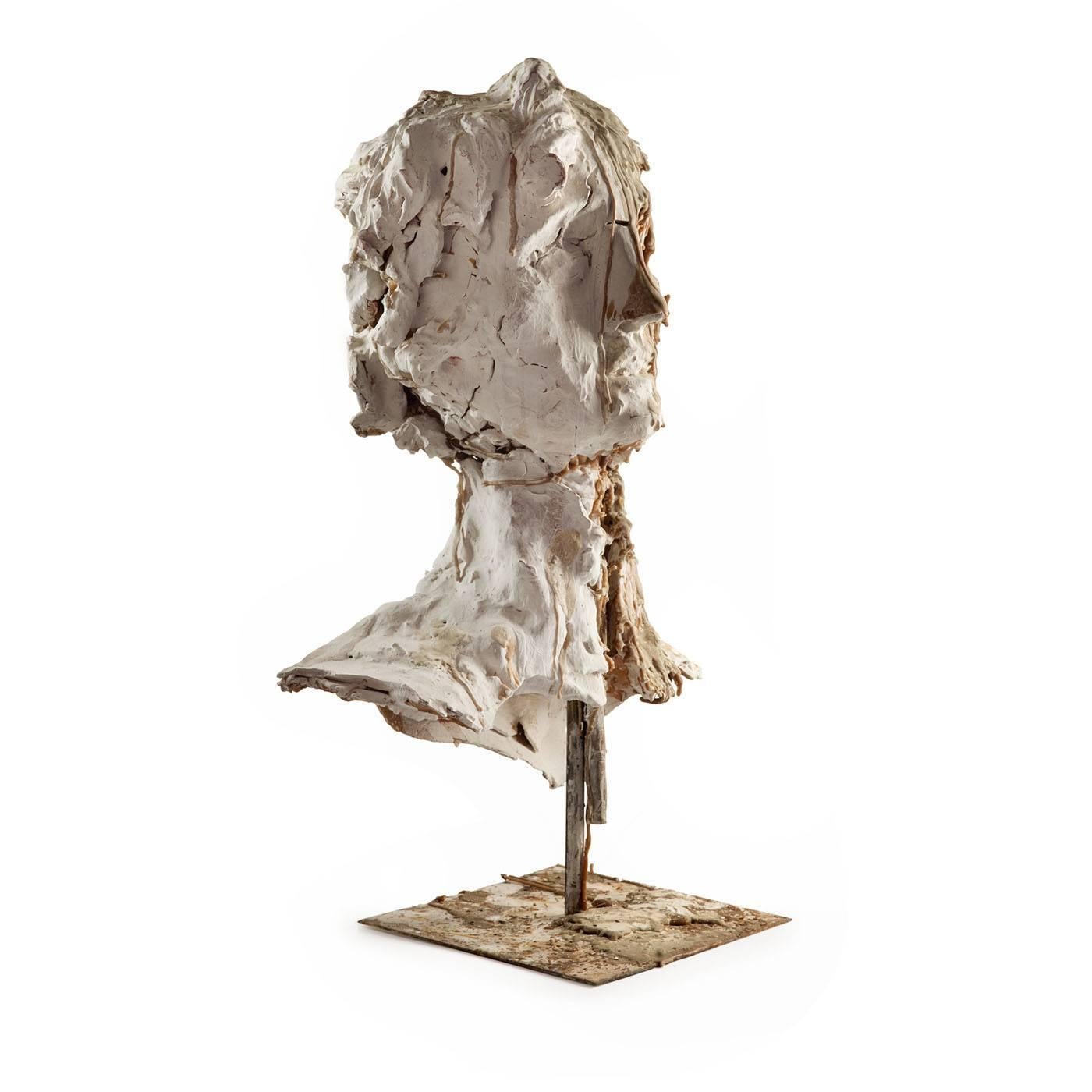 Interesting fragmented multi-colored sculpture made of wax and clay on an iron base, portraying the mythical Dionysius, also in terracotta with white wax coating, such materials having been used to illustrate the link between earth and nature.