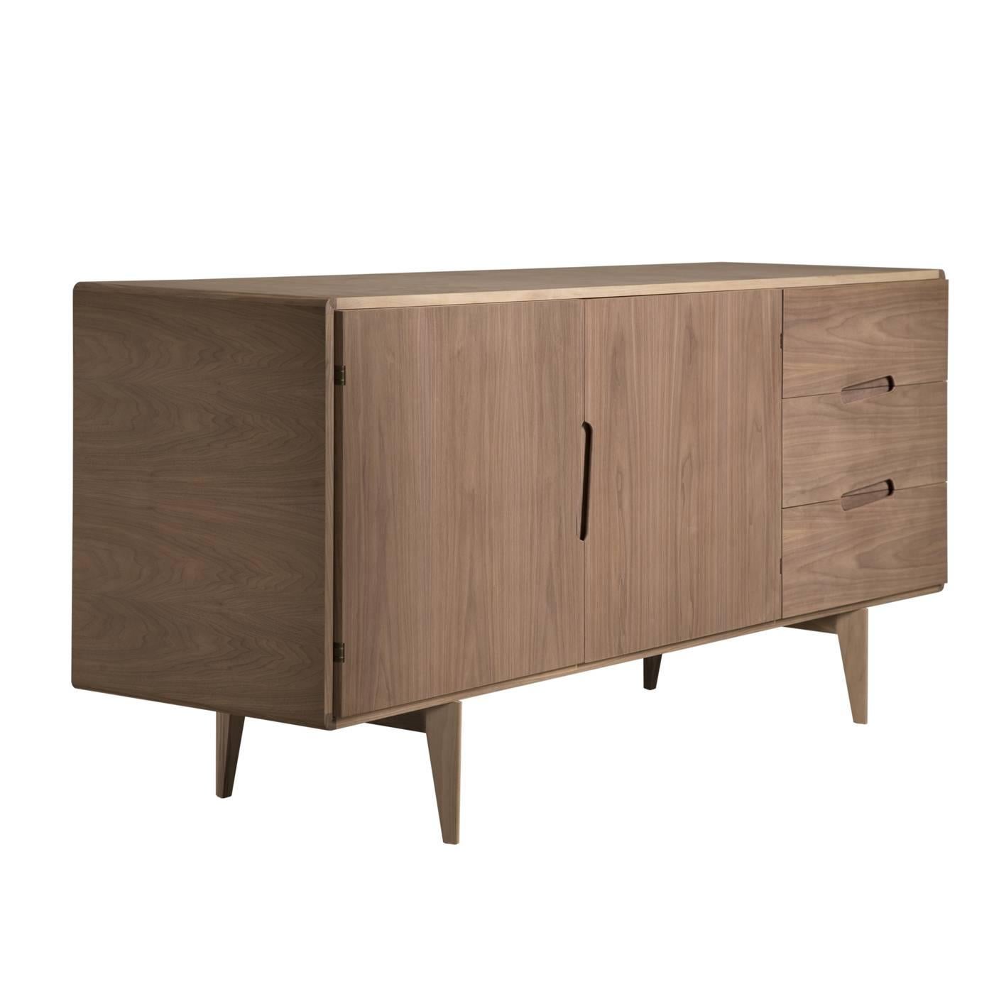 This elegant sideboard is inspired by the style of Californian furniture in the 1960s and 1970s. This living room and bedroom furniture collection was developed by the internal research centre of the MAAM (a museum of art and furnishing with which