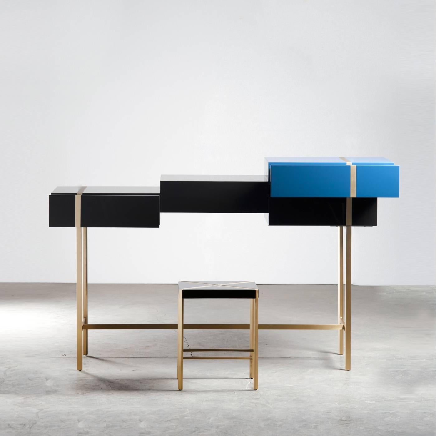 This striking and versatile piece of furniture is inspired by Art Deco with a Minimalist brass structure and a multi-layered wood top decorated with a hand-applied premium resistant lacquer. Paired with the Knod stool, it can function as a vanity,