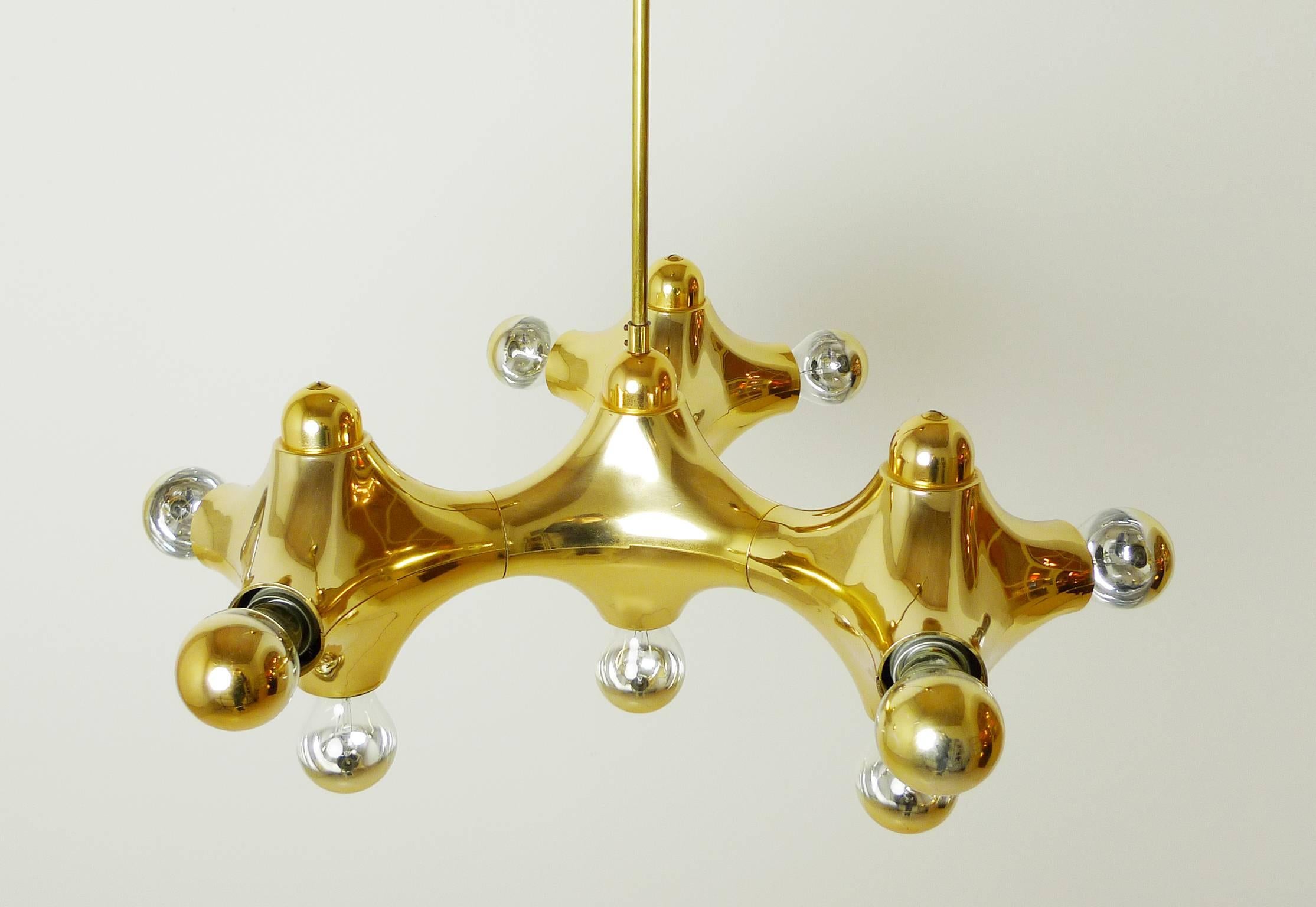 Golden pendant lamp with plastic body and ten bulb fittings for E 27 bulbs. Beautiful molecule design by Gebrüder Cosack in Germany from the 1970s. The pendant lamp is in very good condition.