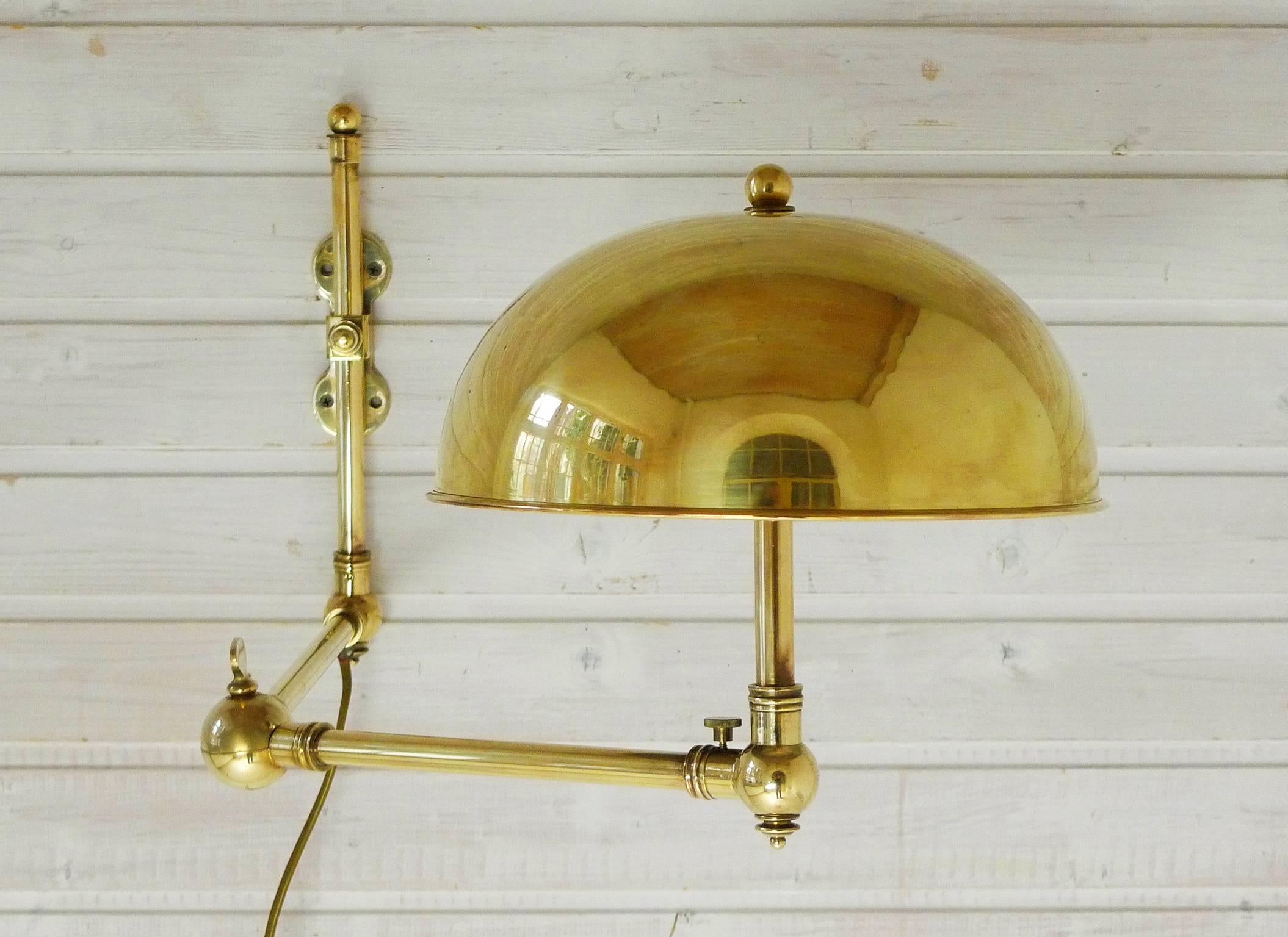 This brass sconce was made for reading maps on a yacht. It reminds of the nautical equipment of Captain Nemos 