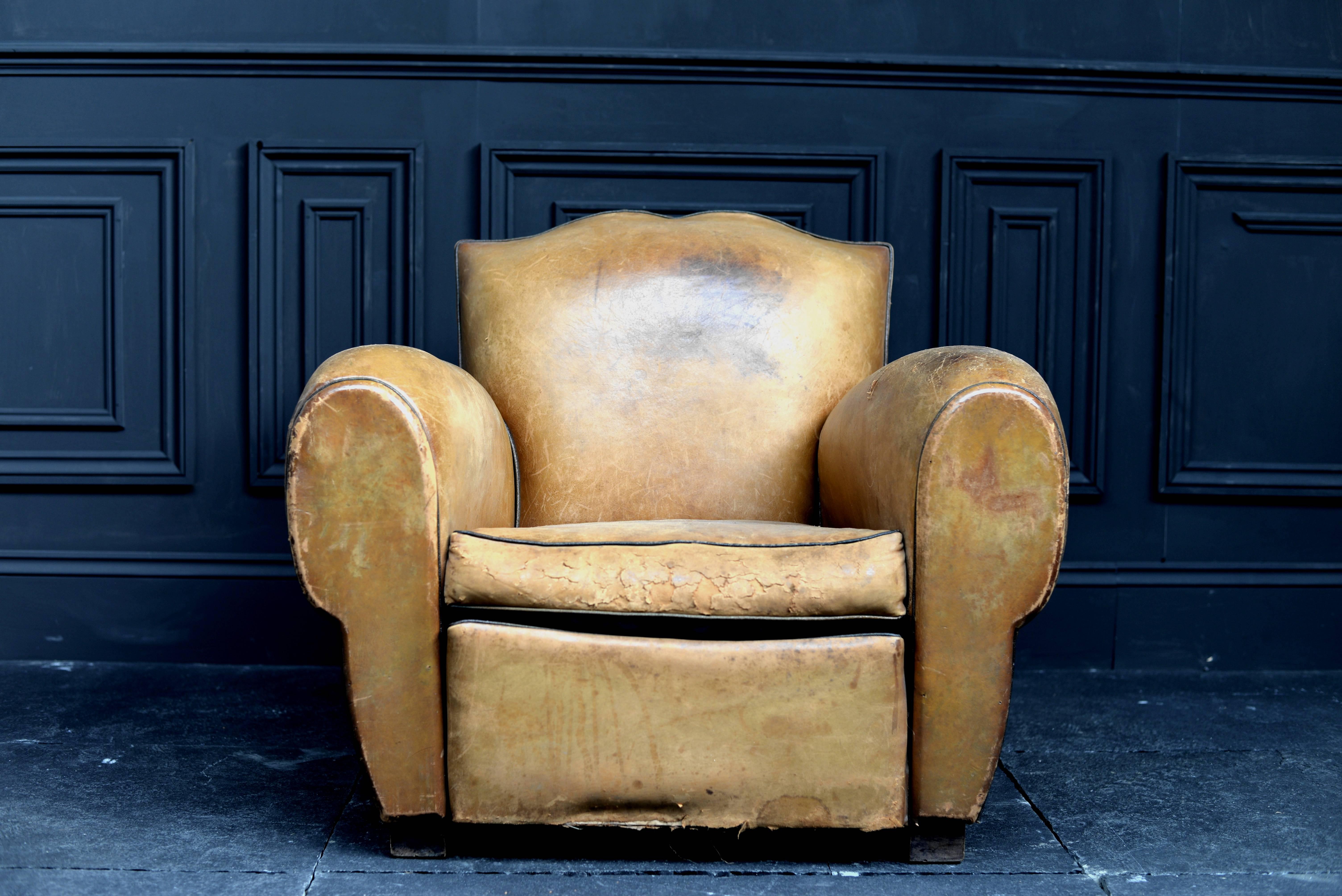 1920s, French leather moustache chair.