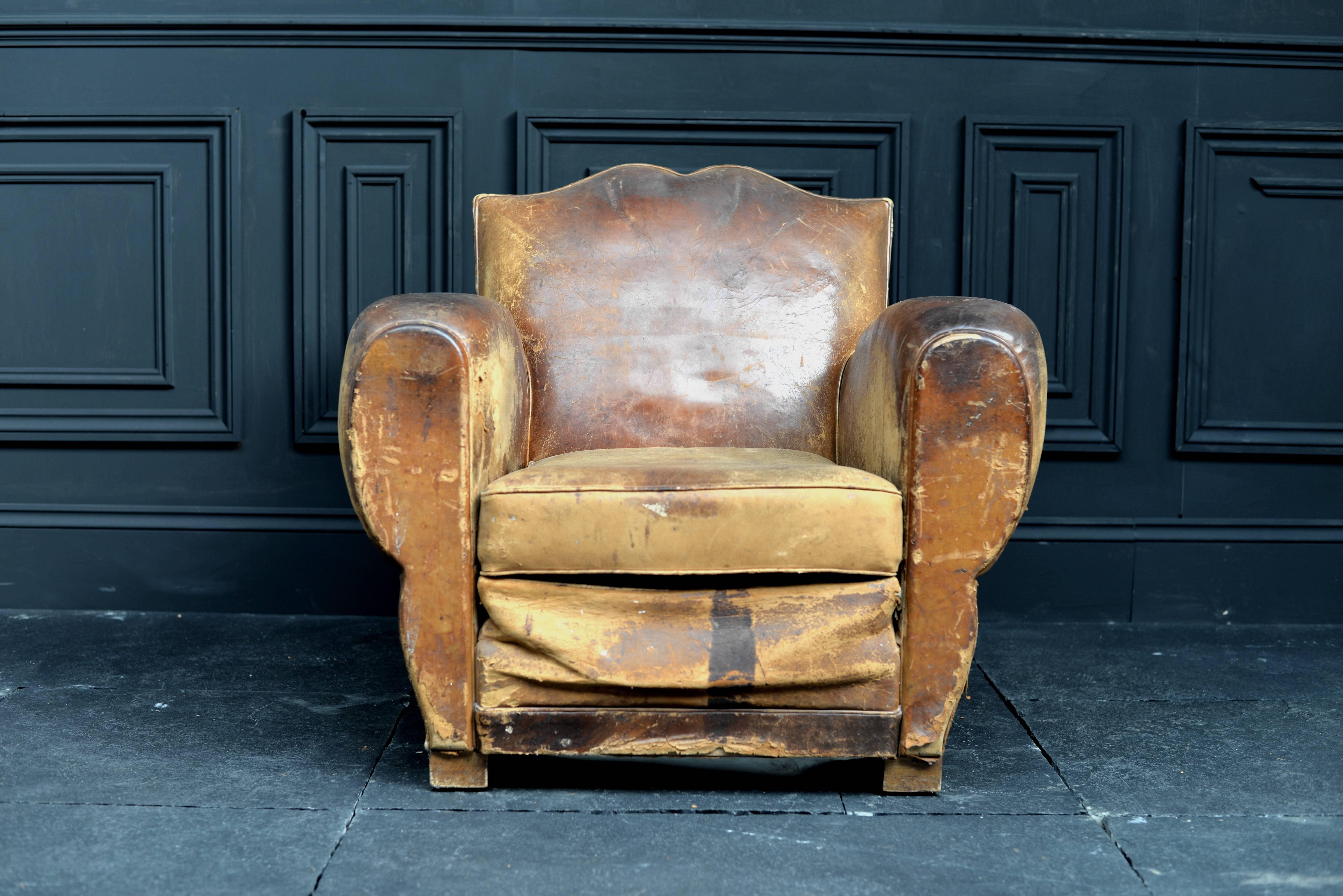 1920s French leather moustache chair.