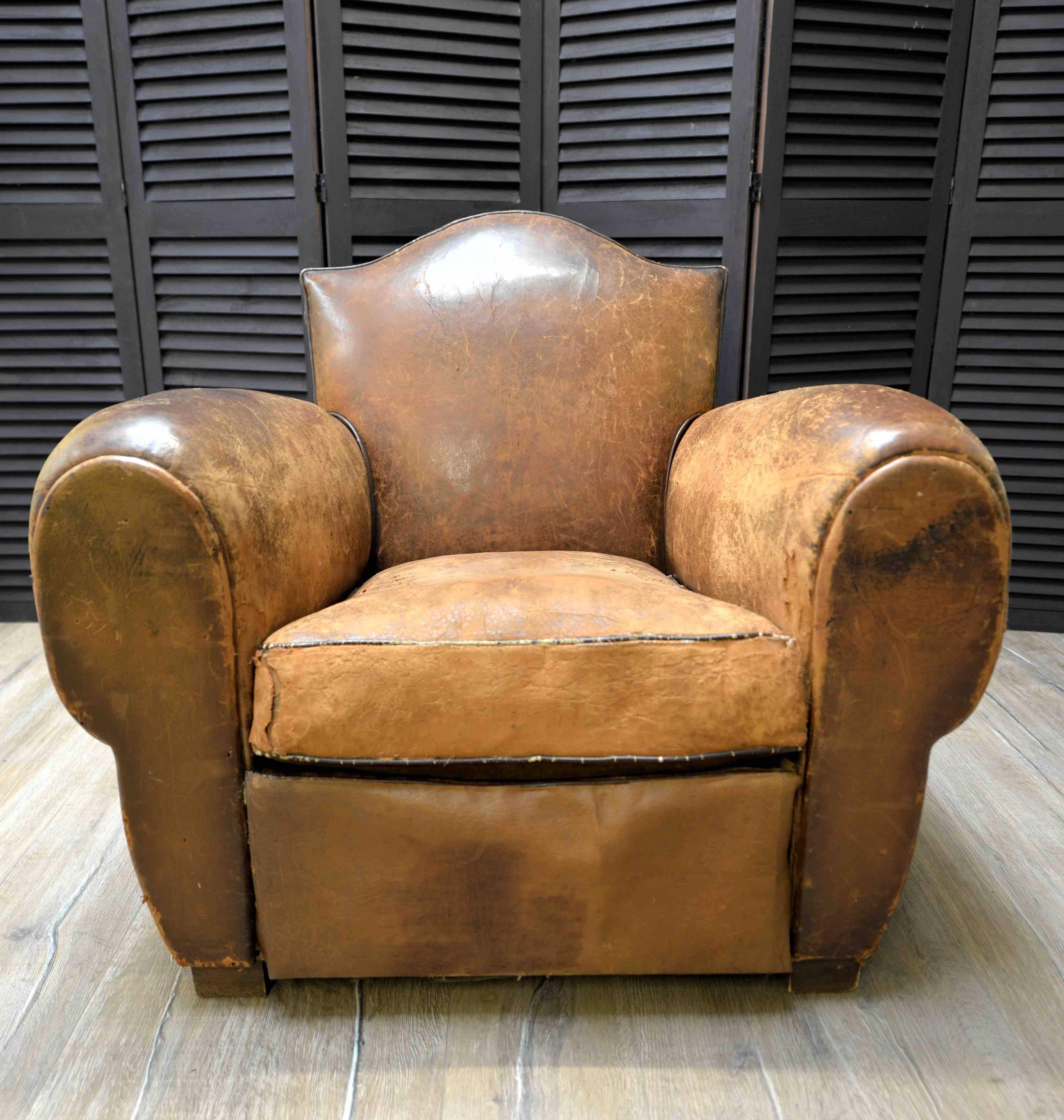 If shipped to the US or EU, no import tax applies.  

With its dramatic curves, this original Art Deco French leather club chair features a deep comfortable seat. Inspired by Rococo of the 18th century France, this design was born during the Art