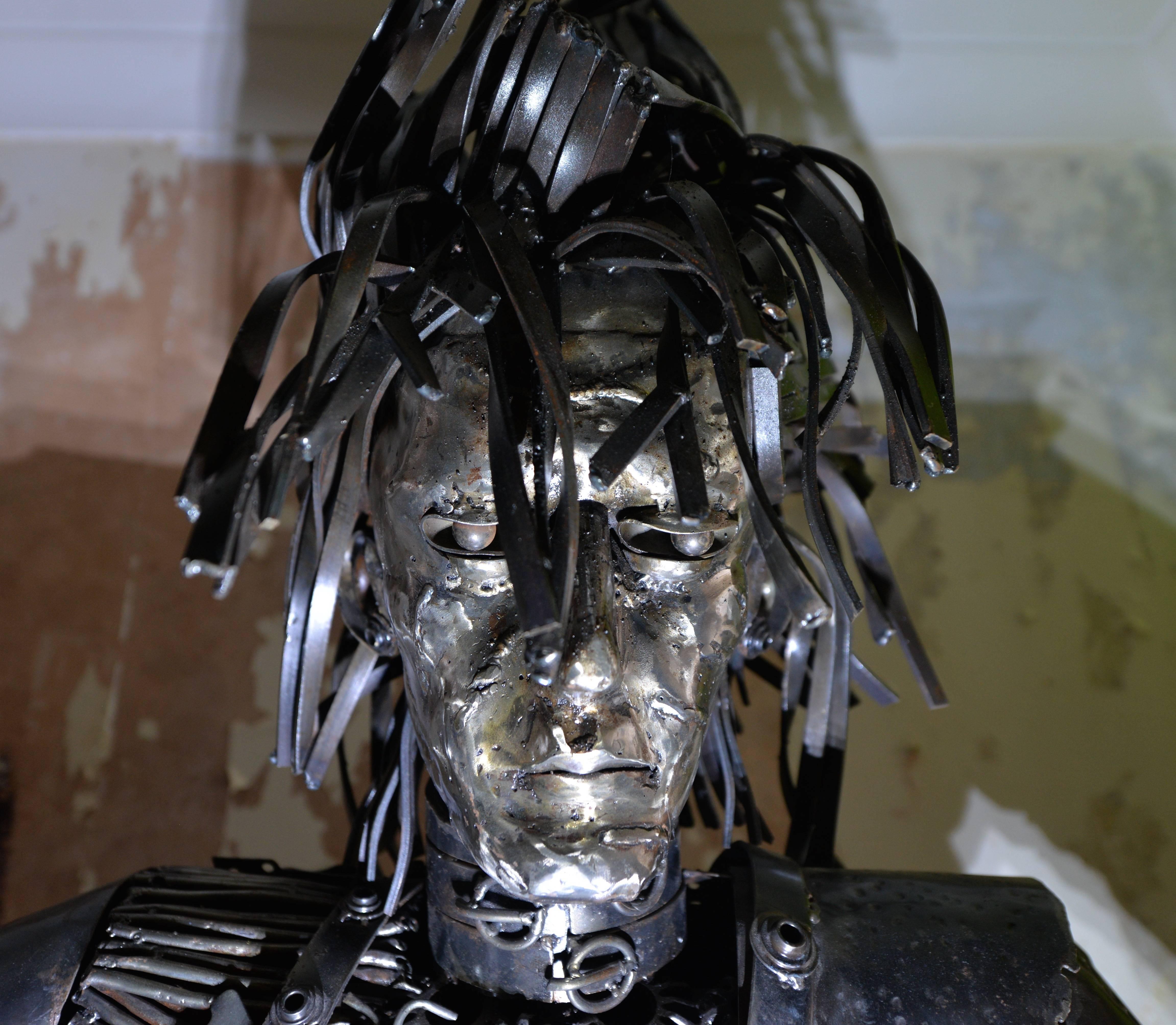 If shipped to the US or EU, no import tax applies.  

Handmade from scrap car parts, this sculpture is a creative representation of the famous fantasy film hero, Edward Scissorhands. Delicately crafted with attention to the most intricate detail,