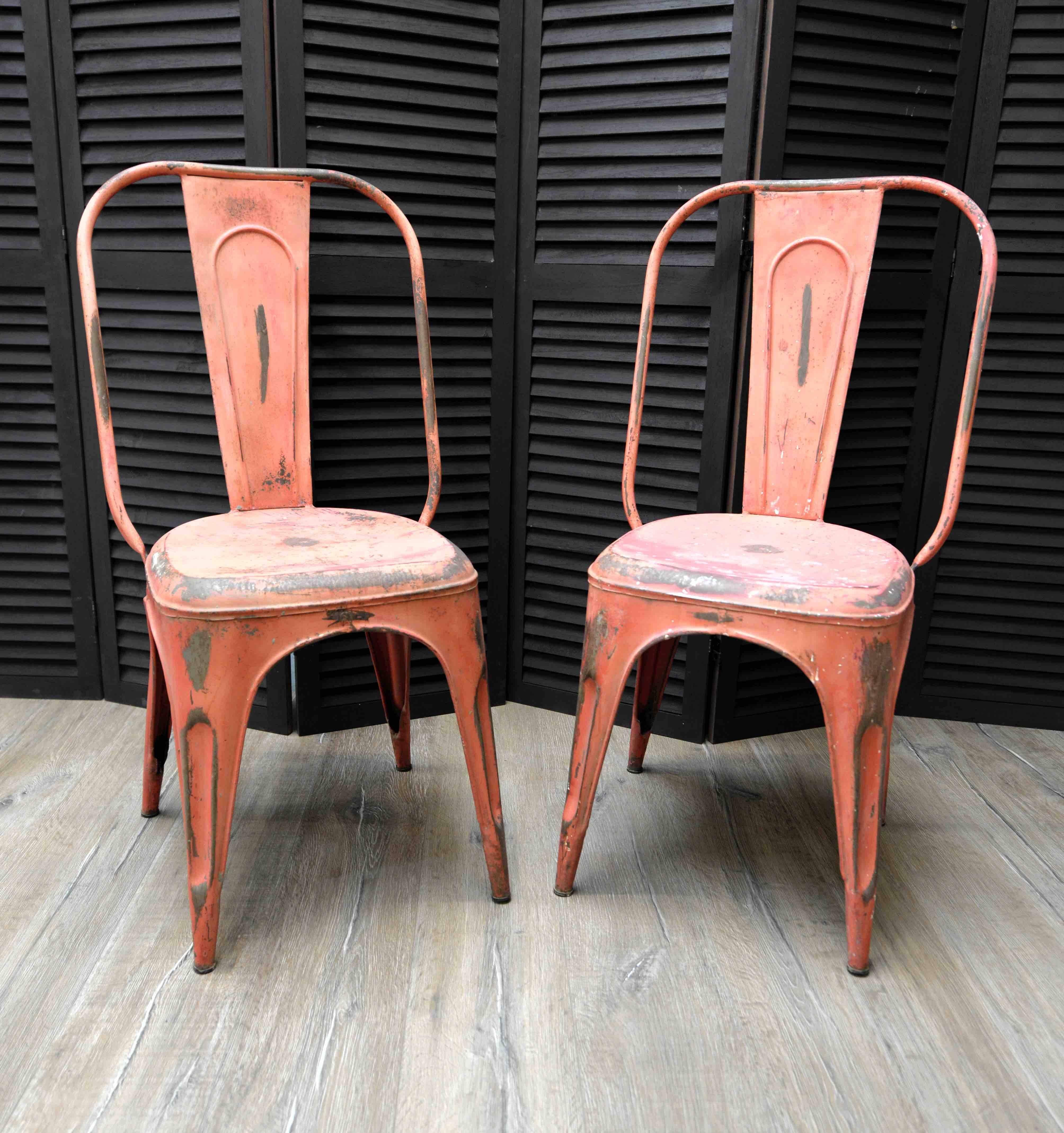If shipped to the US or EU, no import tax applies.  

NOTE: Price is for the pair

The Industrial Design of these chairs is traditional French executed in bright red colour. The worn out look gives them character and individuality reminiscent of