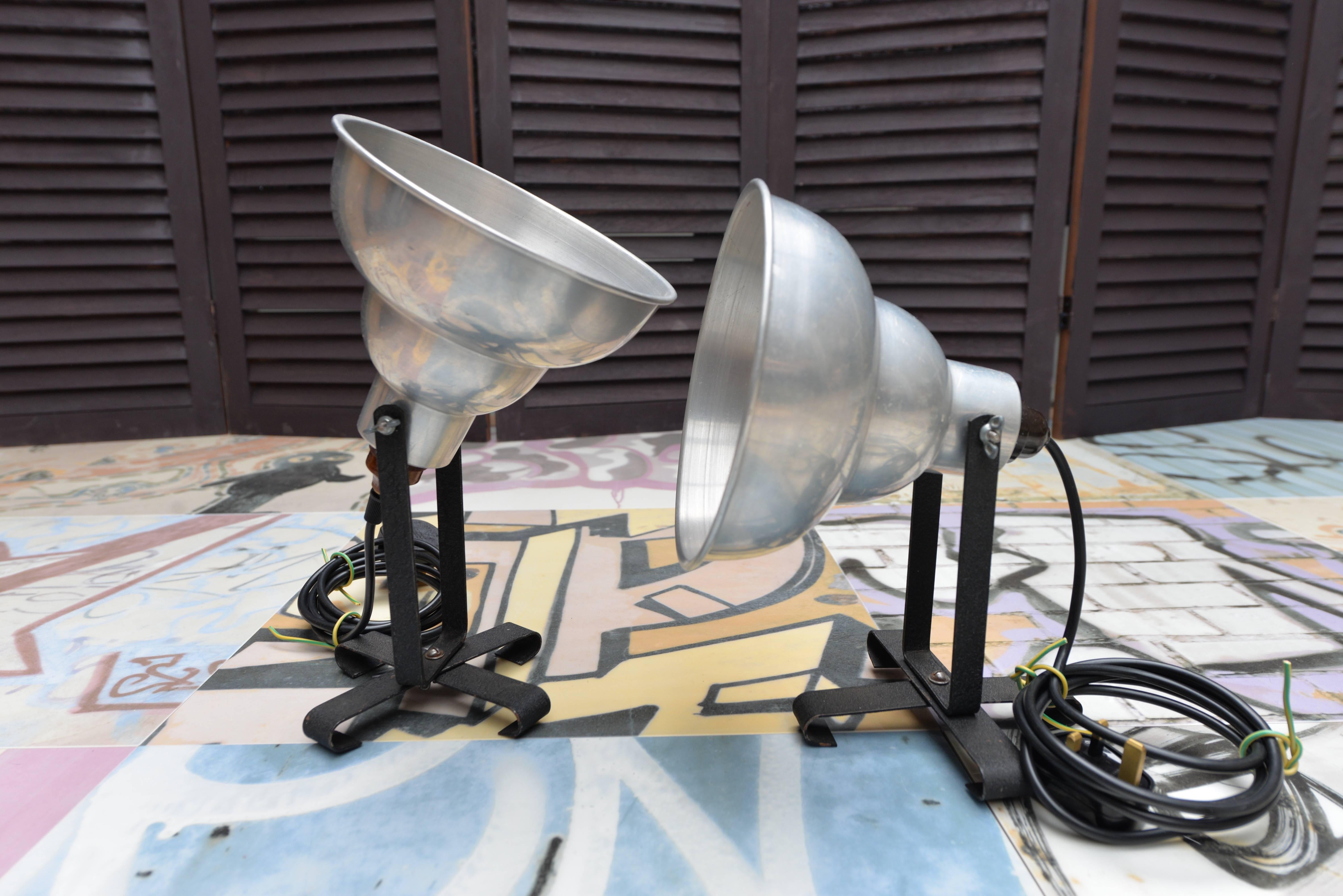 If shipped to the US or EU, no import tax applies. 

This pair of lights has been cleaned, polished and rewired.

The shade moves up and down and the base rotates 360. 
 
