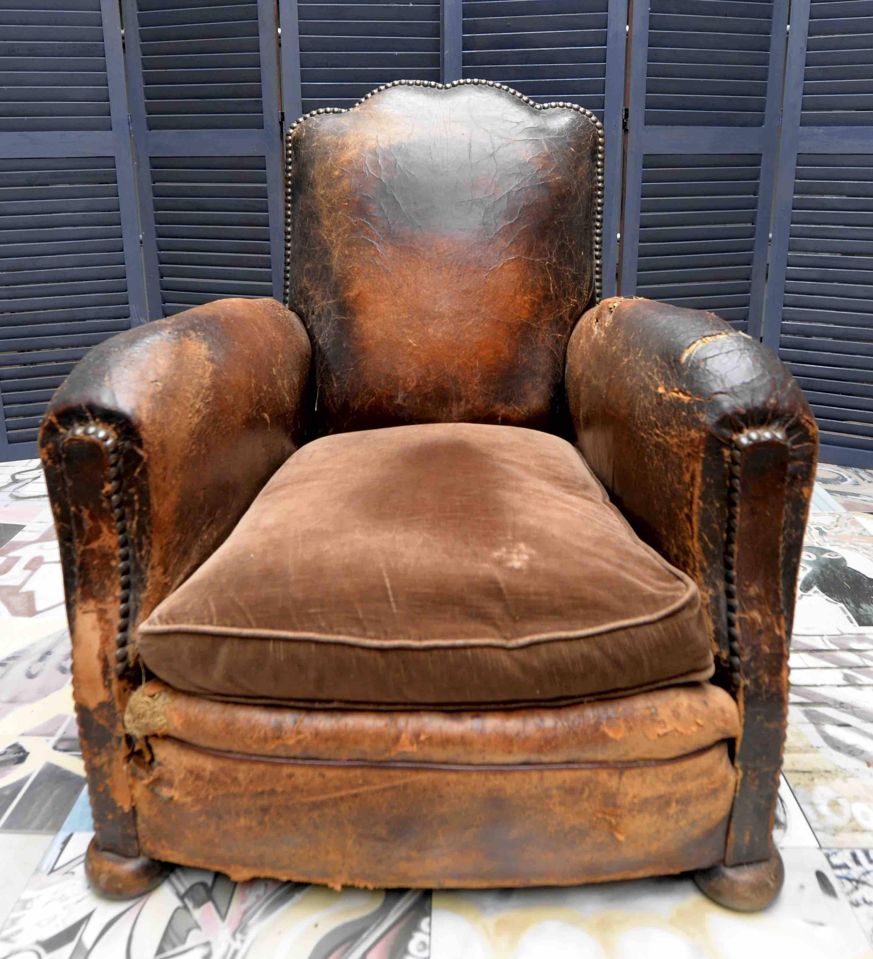 If shipped to the US or EU, no import tax applies. 

Handmade in 19th century France, this chair features original studding and soft velvet feather pillow. The back design is iconic of the period and is rare to find. 

The positioning is very