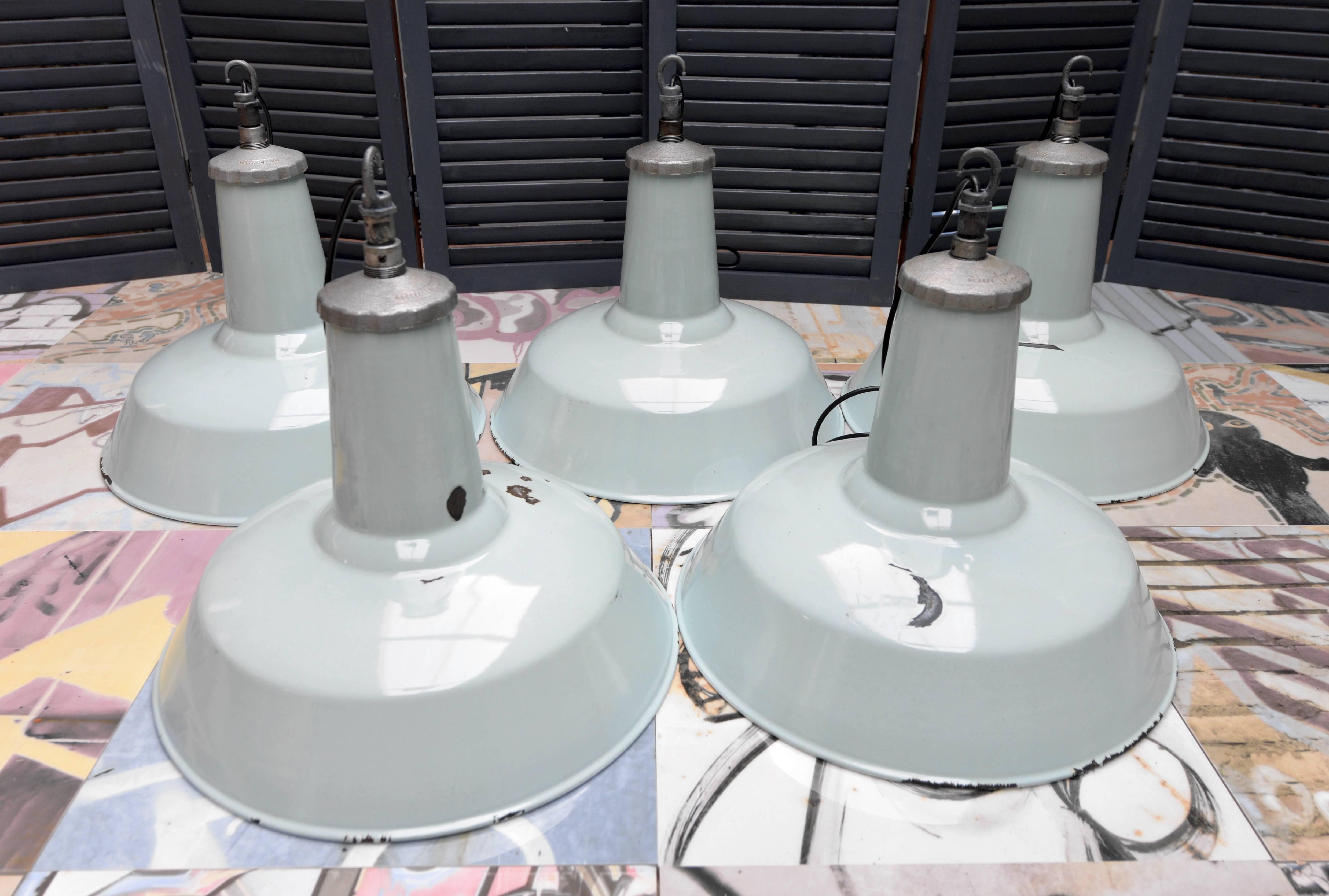 If shipped to the US or EU, no import tax applies. 

The pendants have been cleaned, polished and rewired. 

All shades have ceramic bulb holders and are supplied with suspension chains.