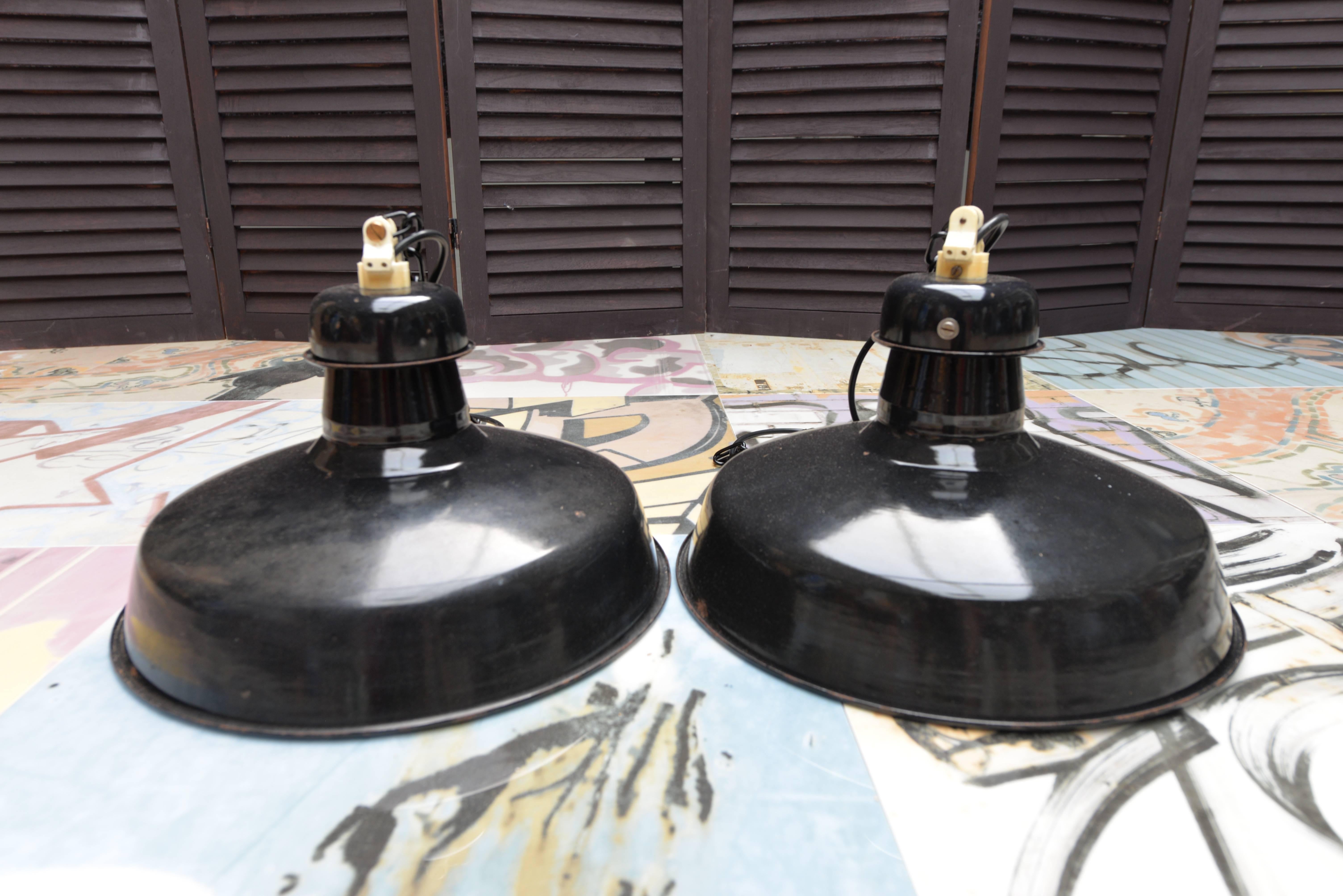 If shipped to the US or EU, no import tax applies. 

These black pendants have been cleaned, polished and rewired.

The bulb fittings are original ceramic and the pendants are supplied with suspension chains.