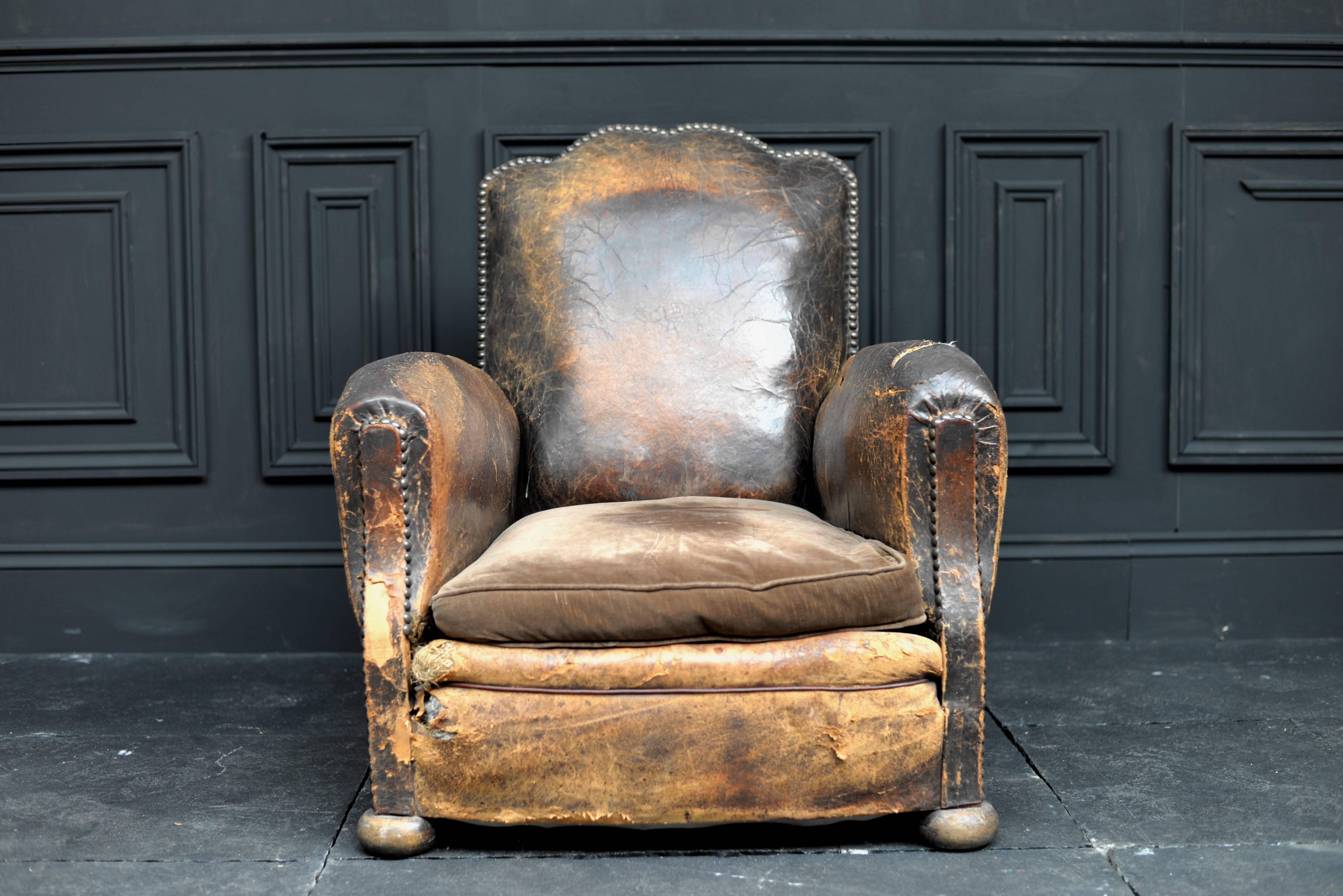 19th century French leather high back moustache chair.