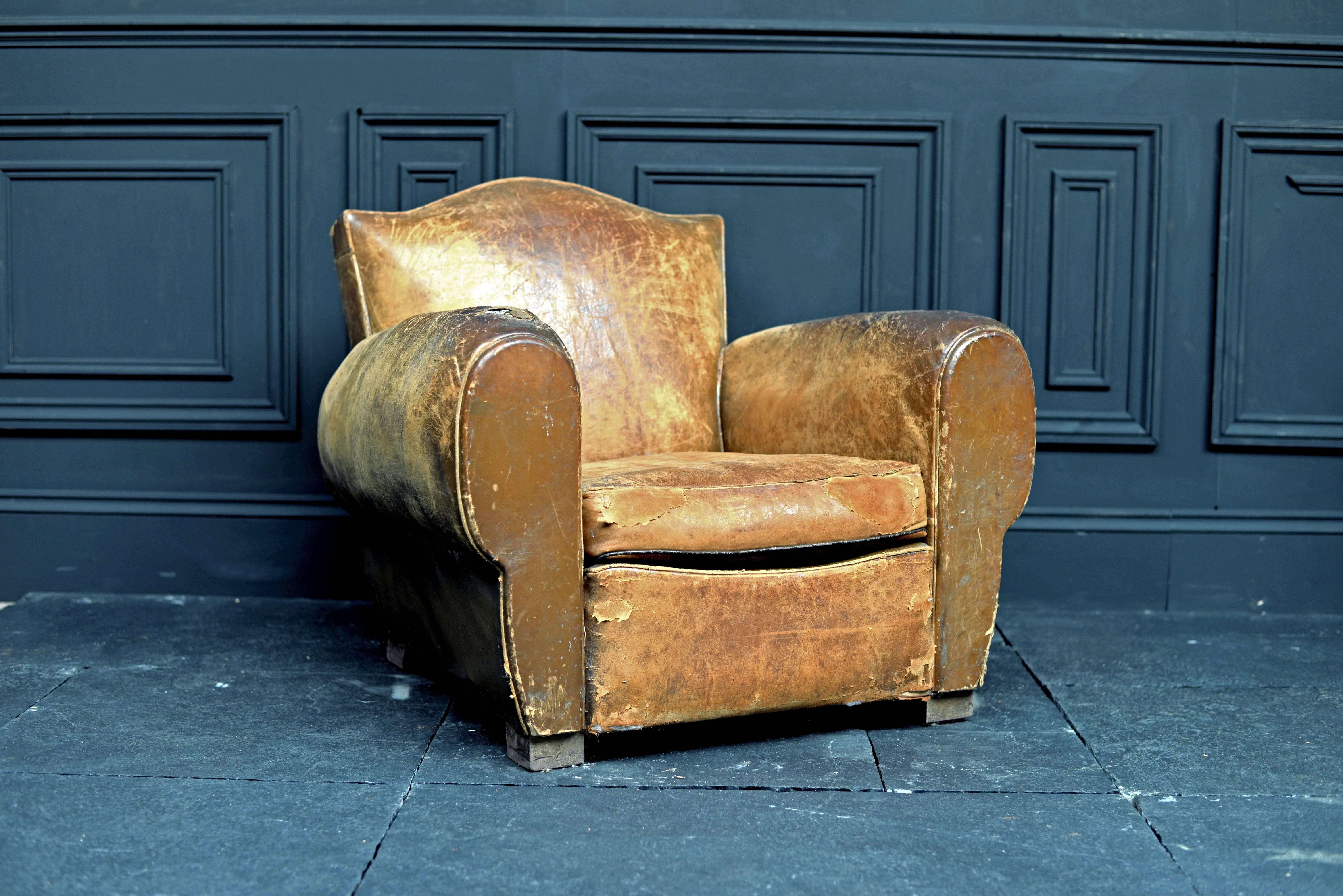1920s French leather Gendarme chair.