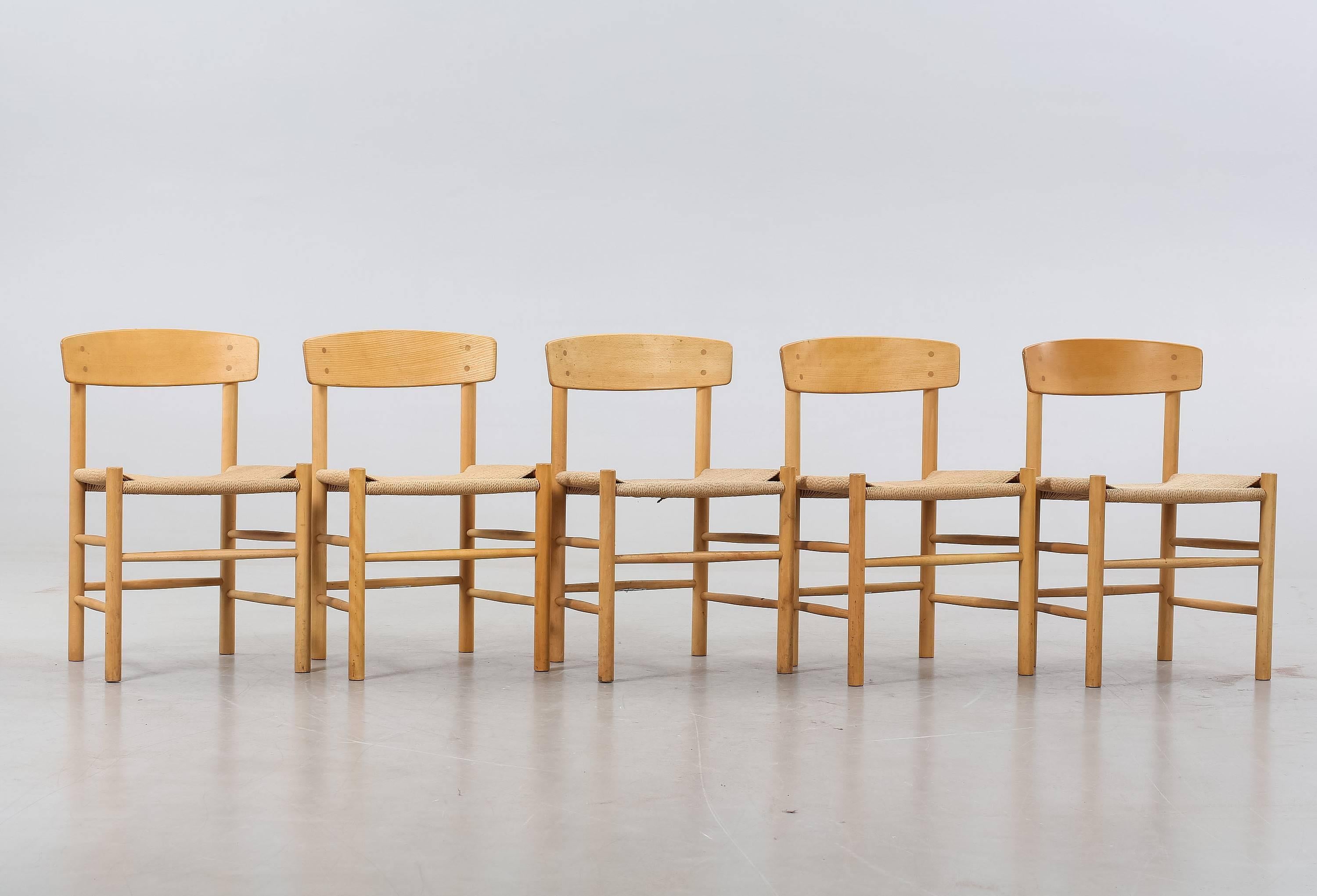 Set of Børge Mogensen dining chairs made in oak, beech and paper cord.