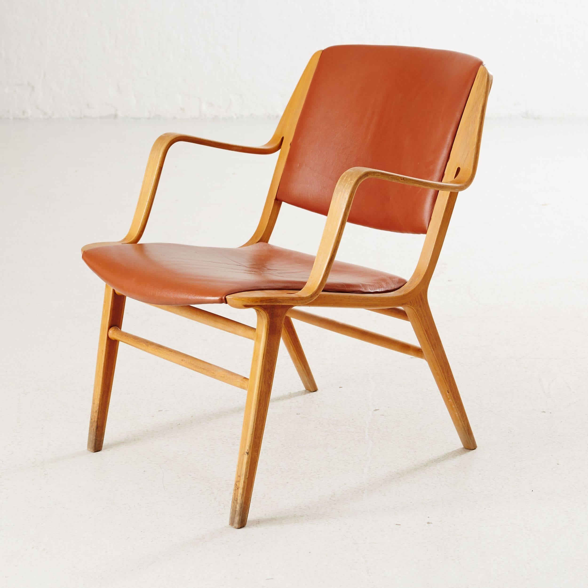 Set of four Danish Ax easy Chairs. 
Armchairs model no. 6020 designed in 1947 by Peter Hvidt and Orla Mølgaard-Nielsen for Fritz-Hansen. Frames made of laminated teak and beech and upholstered in original leather.