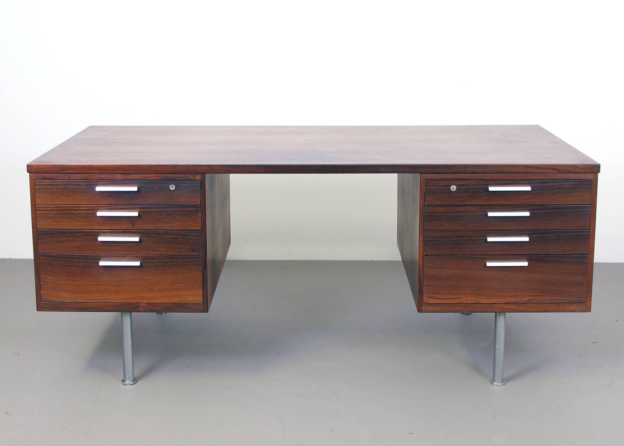 Kai Kristiansen desk for Feldballes Møbelfabrik. Rosewood veneer with nice light/dark contrasts and chromed steel legs.