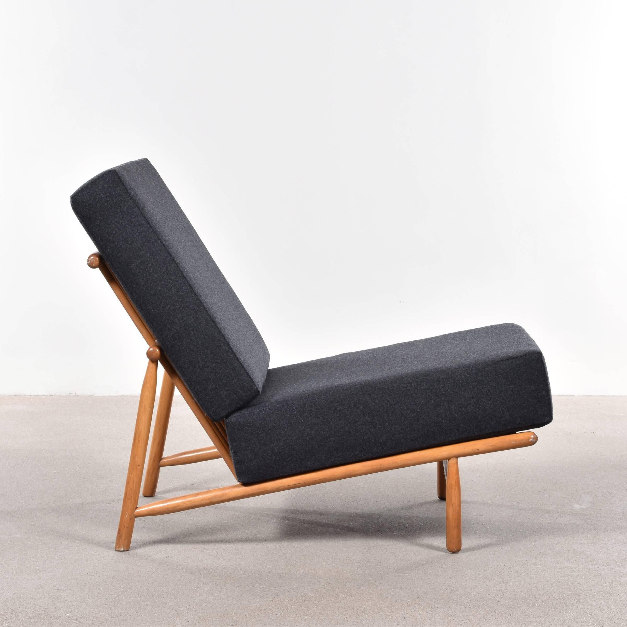 Stylish lounge chair by Alf Svensson for Artifort Netherlands (DUX Collection). Very good condition with beech wooden frame and new dark grey/charcoal wool upholstery.

Free shipping for European destinations!

We strive for a high level of