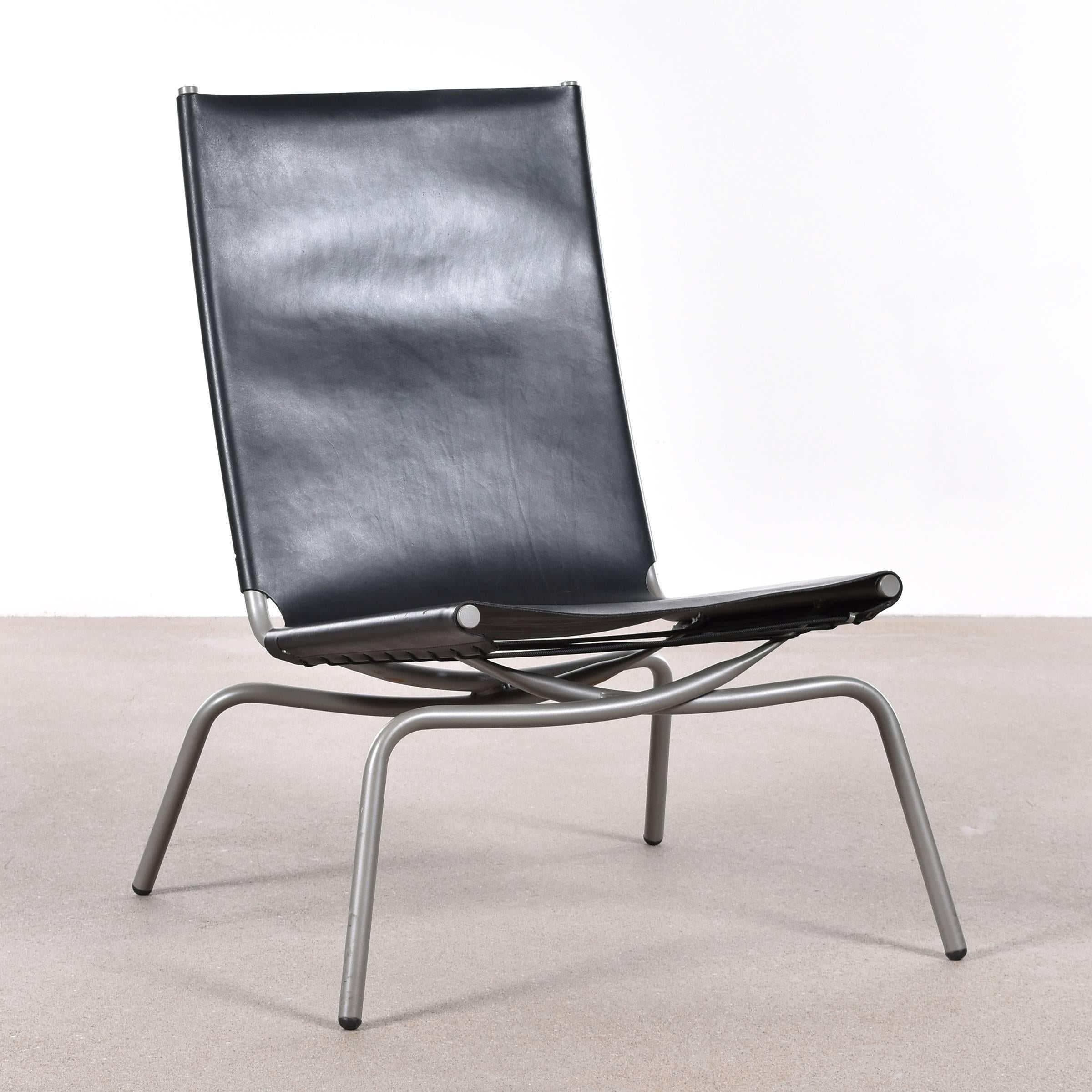 Nice lounge chair by Fabiaan Van Severen with crossed legs grey coated metal tubular frame and thick black leather upholstery fastened with rope. Very good original condition.

Free shipping for European destinations!

We strive for a high level