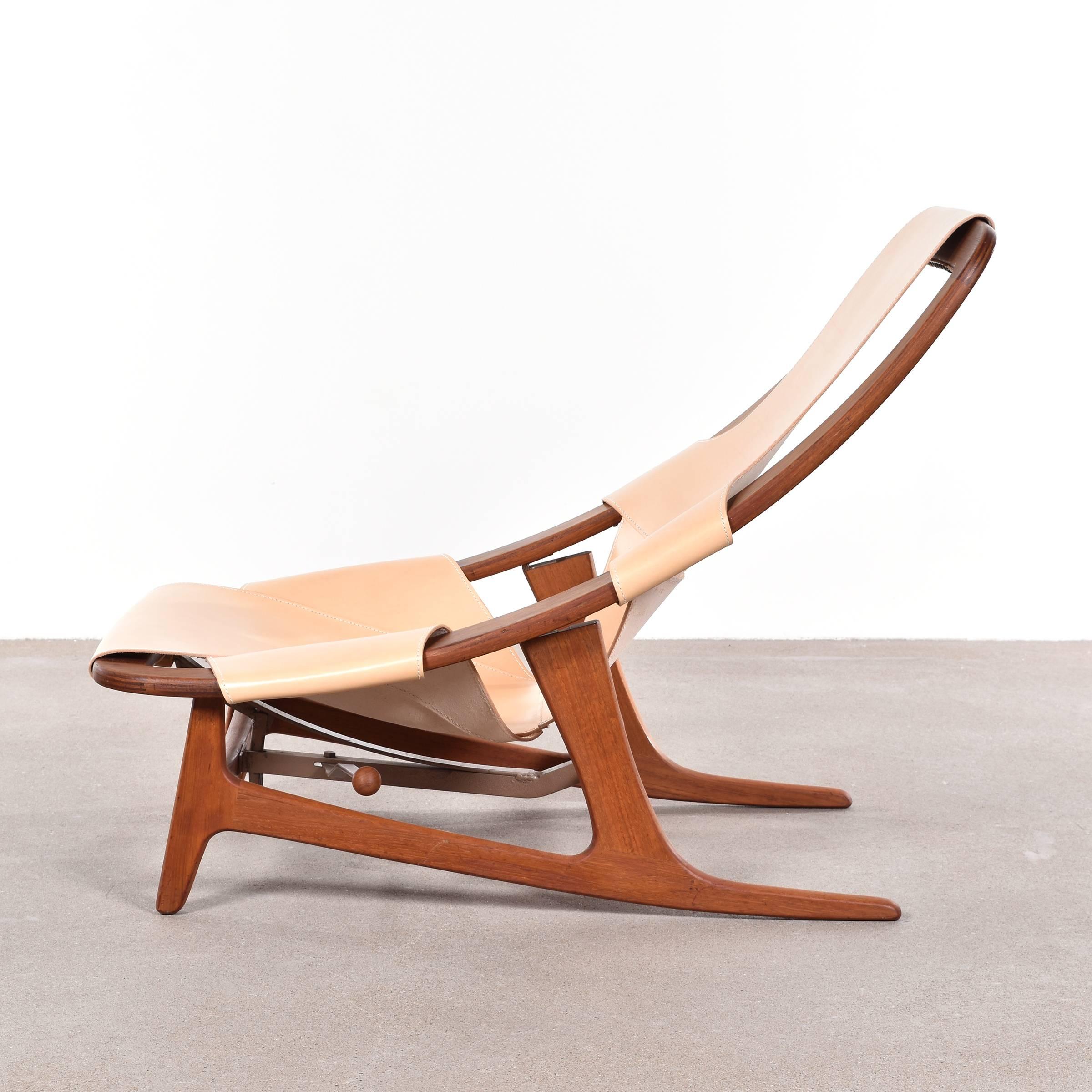 Very rare lounge chair by Arne Tidemand-Ruud for Norcraft. Original teak frame and upholstered with new saddle leather, all in very good / excellent condition. The seating position can be adjusted.