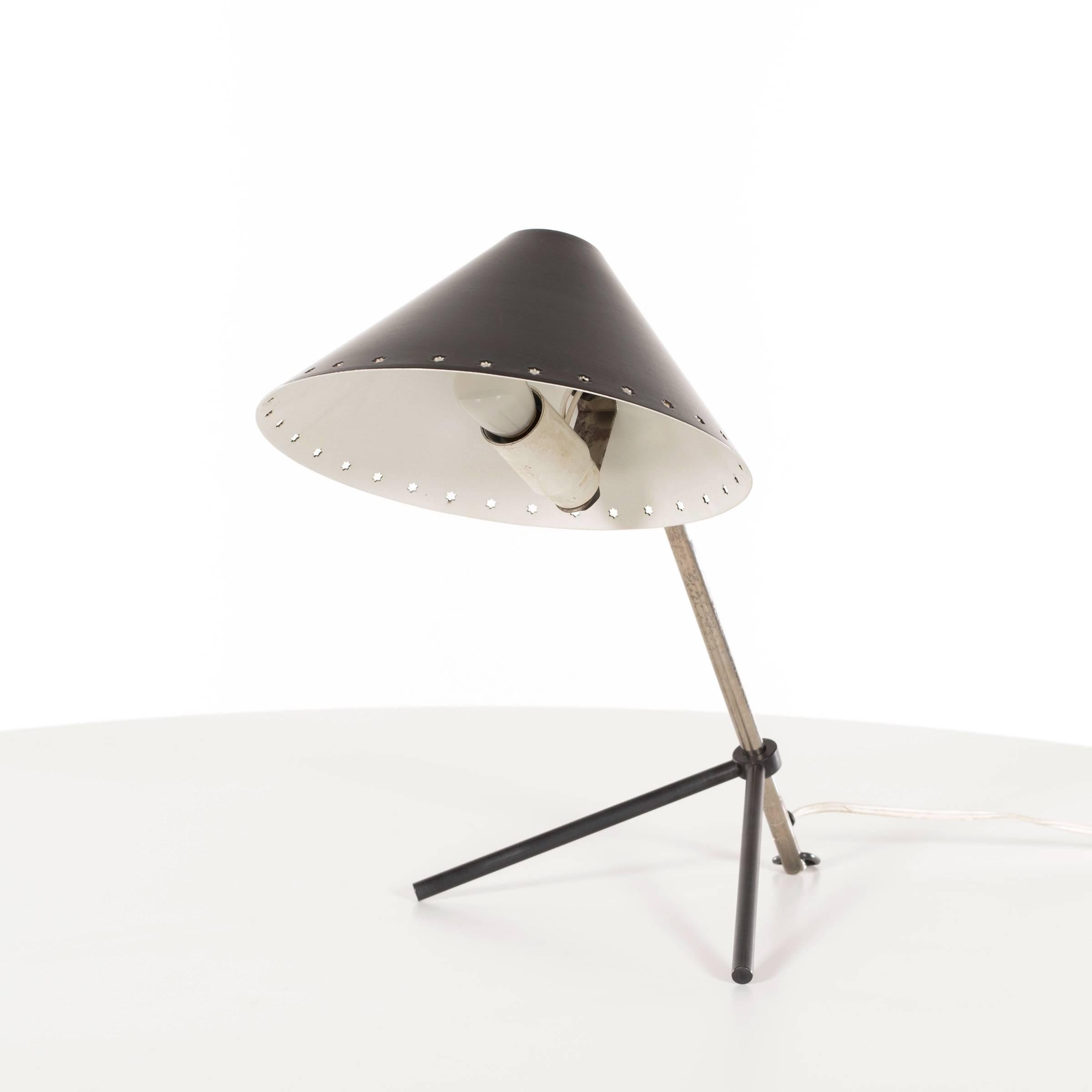 Elegant and stylish table or wall lamp for Dutch lighting company Hala. Tripod base adjustable in height and angle. Minimalistic, beautiful and well thought out designed lamp in very good original condition. 