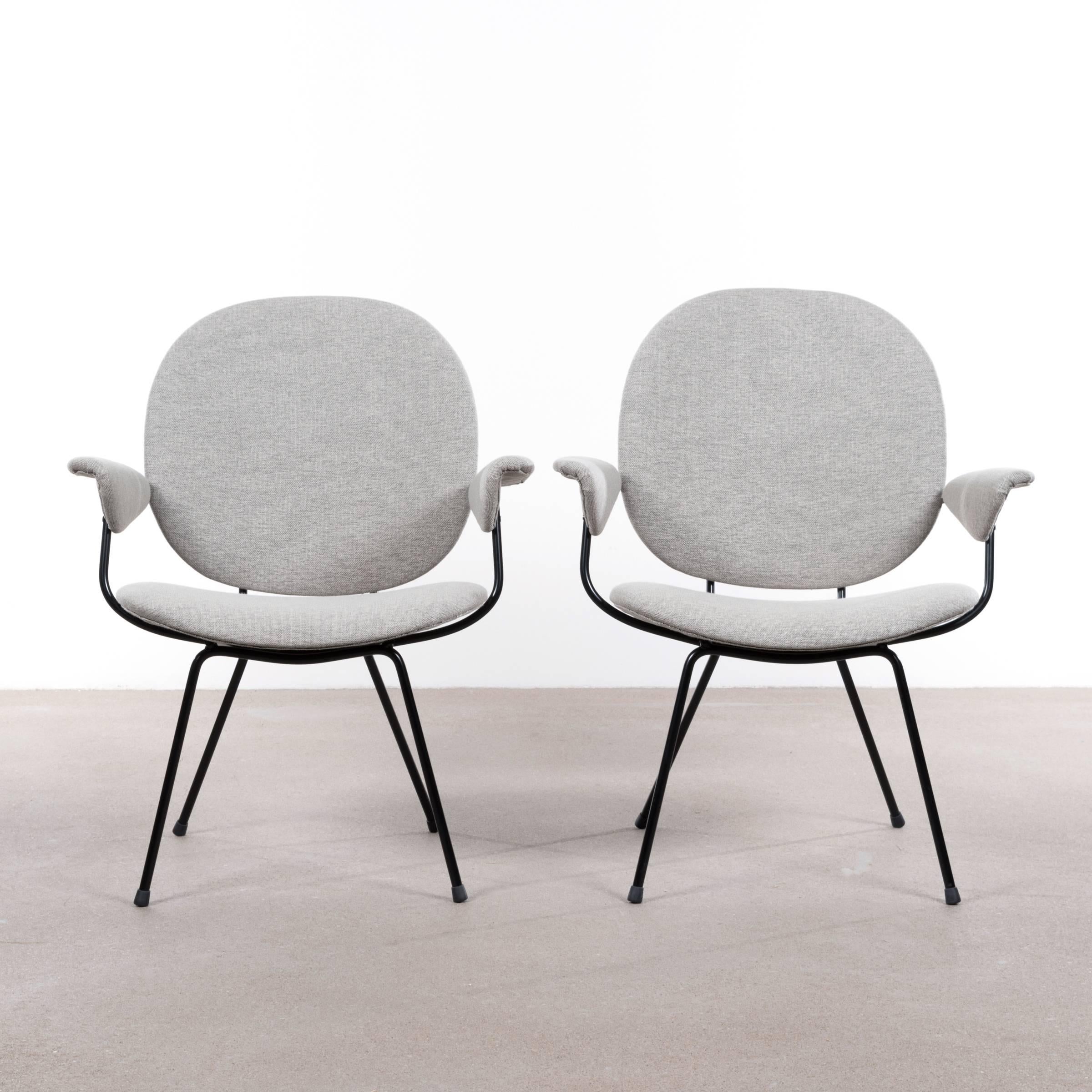 Beautiful, comfortable and elegant easy chairs designed by WH Gispen. Excellent condition with new light grey De Ploeg upholstery and black powder coated frames.