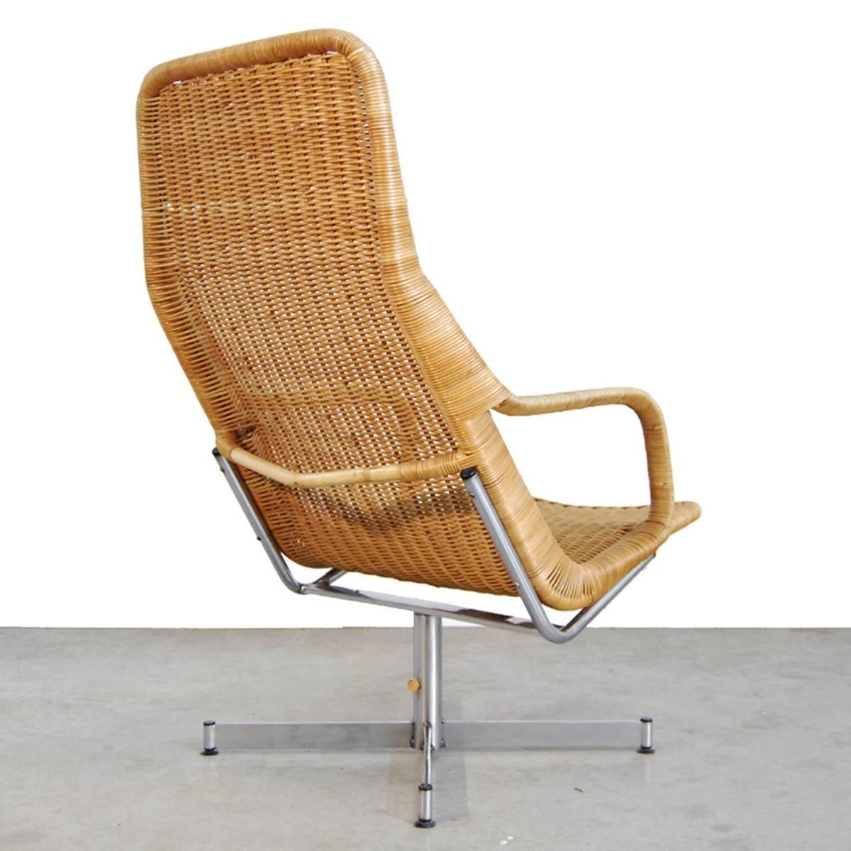 Elegant lounge chair by Dirk van Sliedregt for Gebroeders Jonkers, Noordwolde, Netherlands 1961. Rattan seating with chrome-plated metal frame. Good original condition with light traces of use.