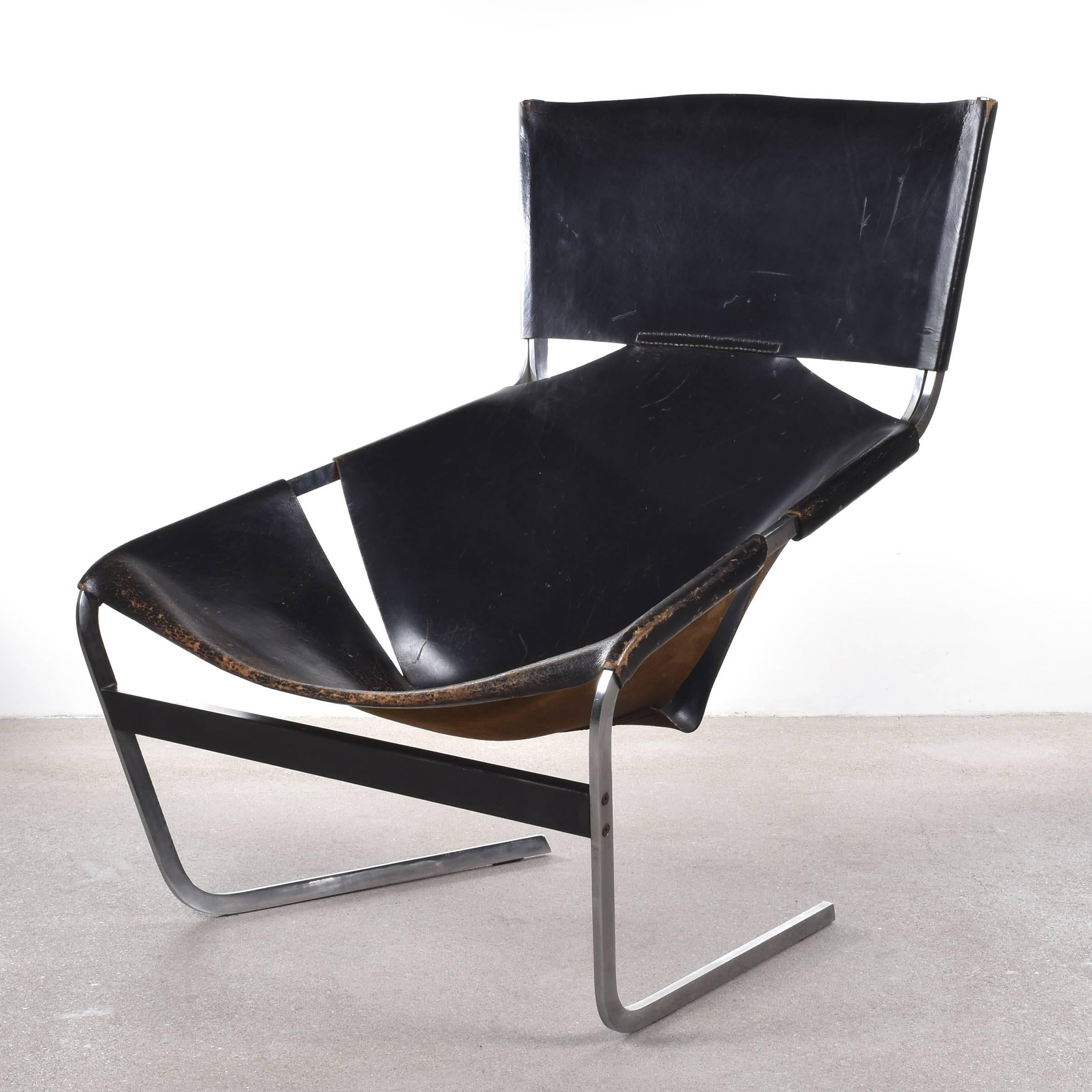 Sturdy, massive and comfortable lounge chair. Complete original chair both saddle leather and stitching with very good patina. Signed with Artifort metal label.

Free shipping for European destinations!

We strive for a high level of service and