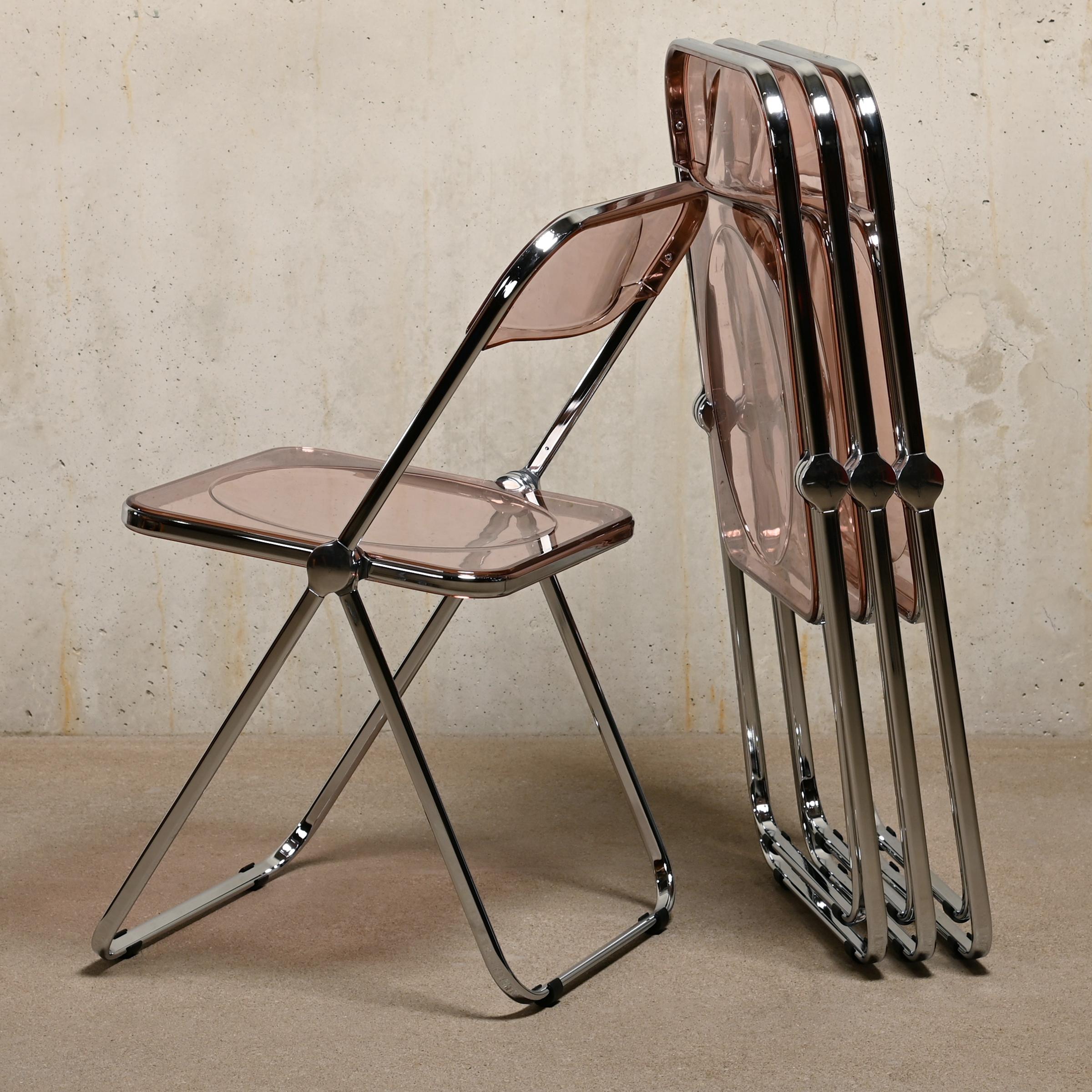 The Plia folding chair is an inventive and beautiful design by Giancarlo Piretti for Castelli in 1967, Italy. This icon is included in every standard publication on 20th century (furniture) design. It has a simple folding mechanism so the chair can