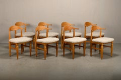Henning Kjærnulf brutalist dining chairs set in Oak and Sheepskin, Denmark 1960s
