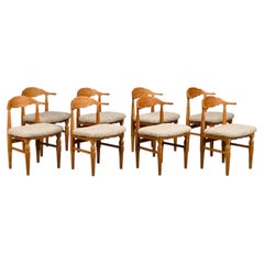 Henning Kjærnulf brutalist dining chairs set in Oak and Sheepskin, Denmark 1960s