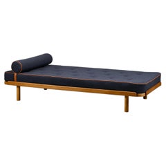 Scandinavian Daybed in Oak and dark Blue bouclé fabric with Leather accents