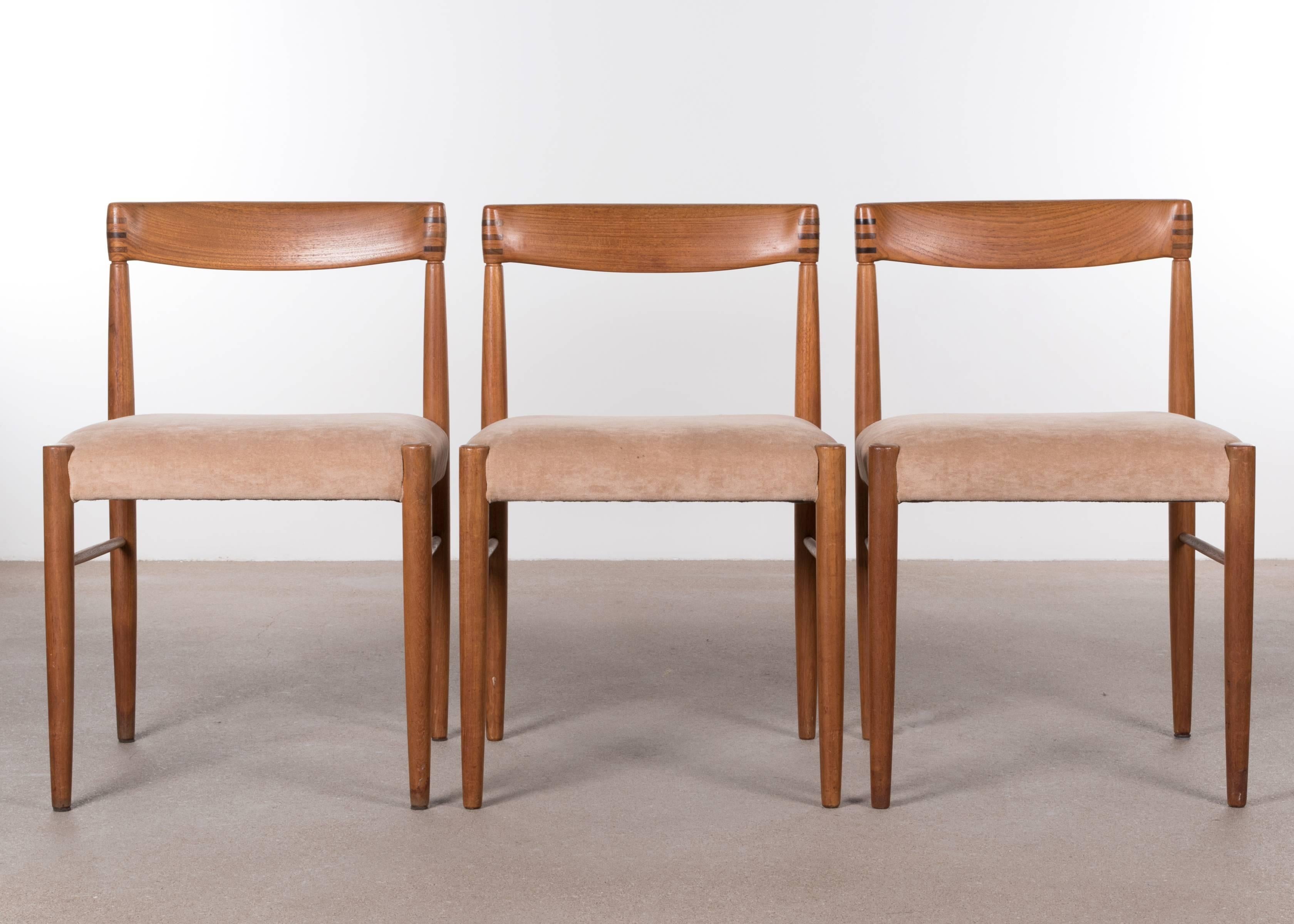 Dining chairs set by Henry Walter Klein for Bramin Mobler. Teak frames with beautiful details (joints) and elegant shapes all in original condition. Slight traces of use. Contact us for reupholstery possibilities if you desire a different fabric /