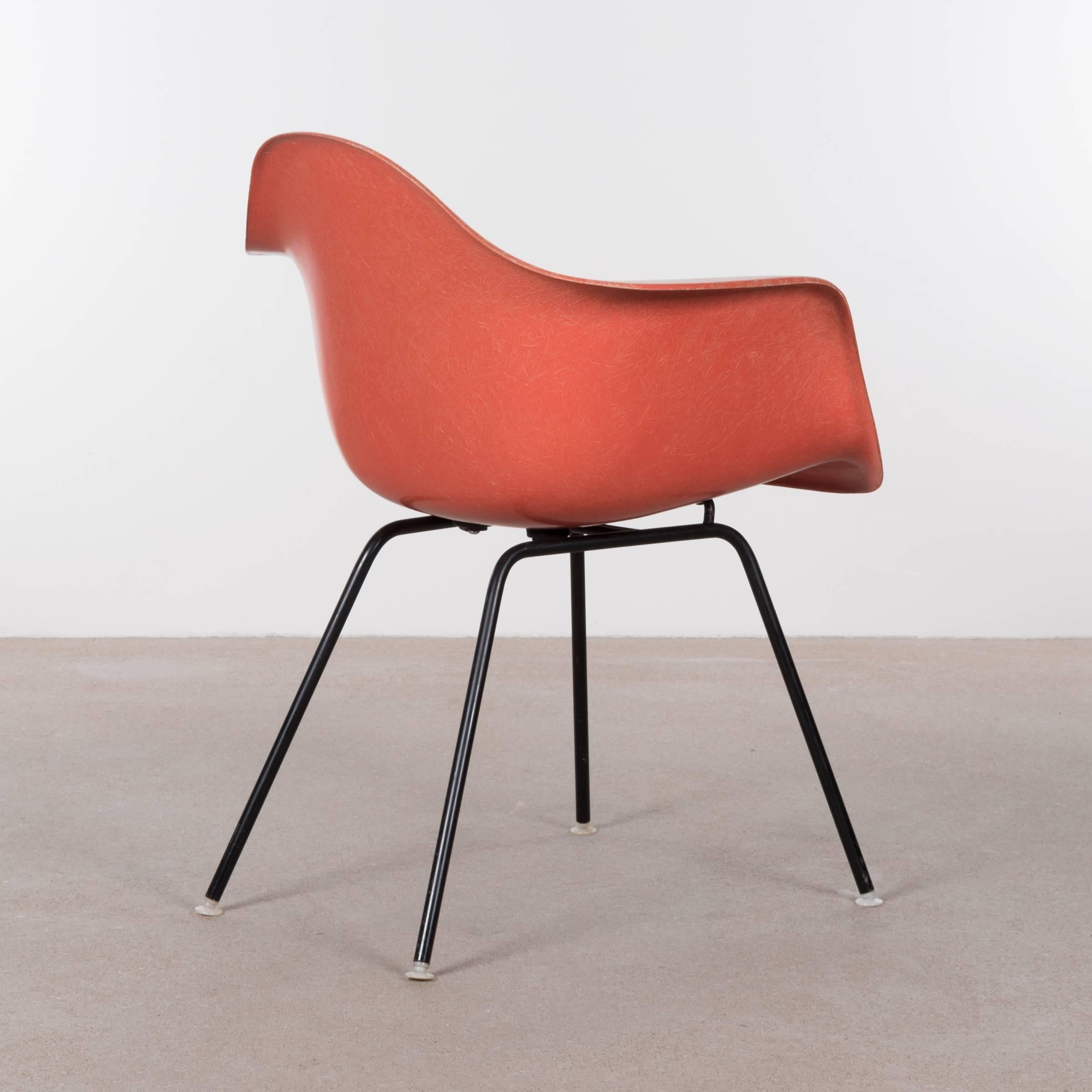 Early iconic DAX chairs in Salmon. All chairs are in excellent original condition and are signed with manufacturer label and date stamps.

Two chairs are sold.