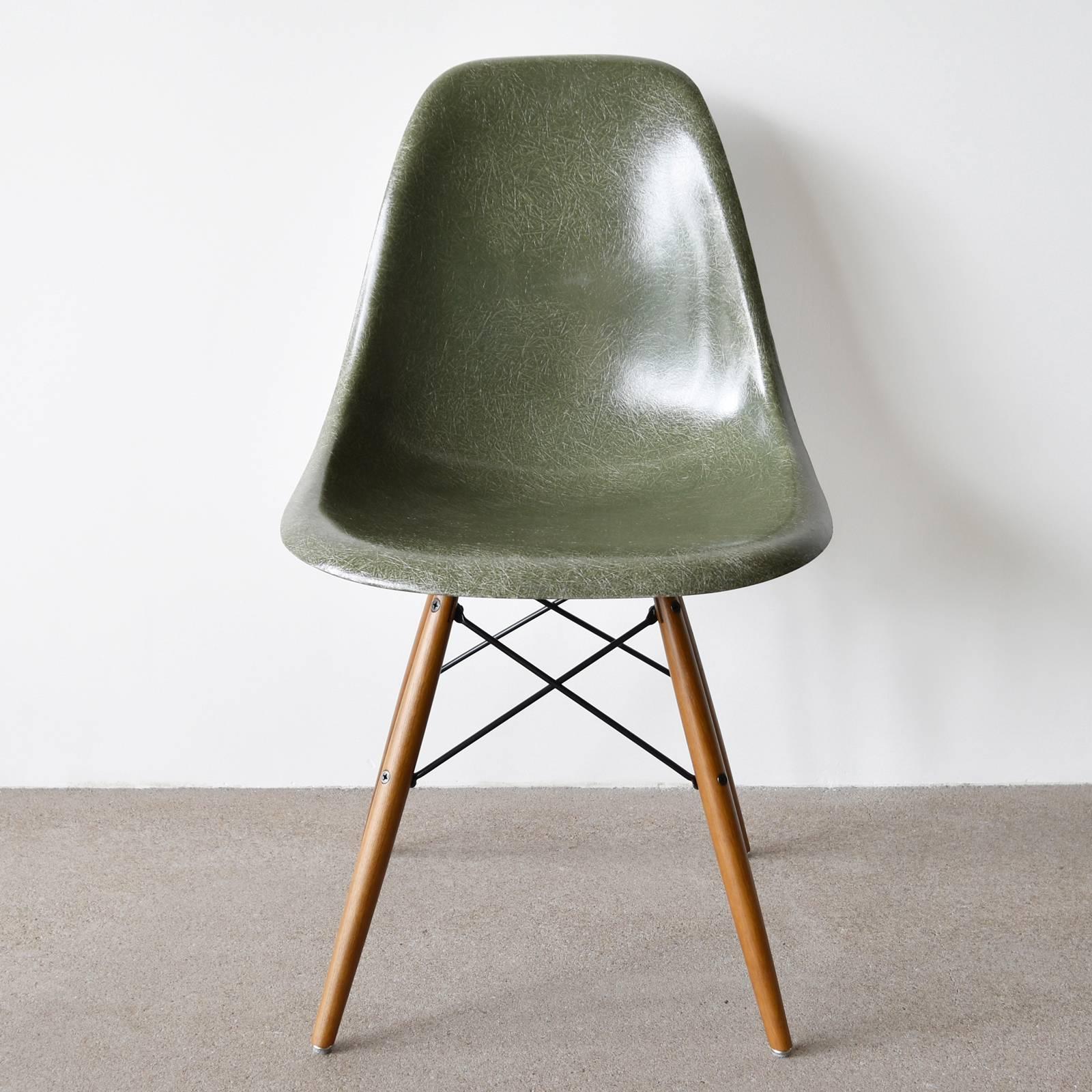 Beautiful iconic olive green dark DSW chairs. The shells are in very good / excellent condition with only slight traces of use. Replaced shock mounts which guarantee save usability for the next decades. Each chair is signed with embossed Herman