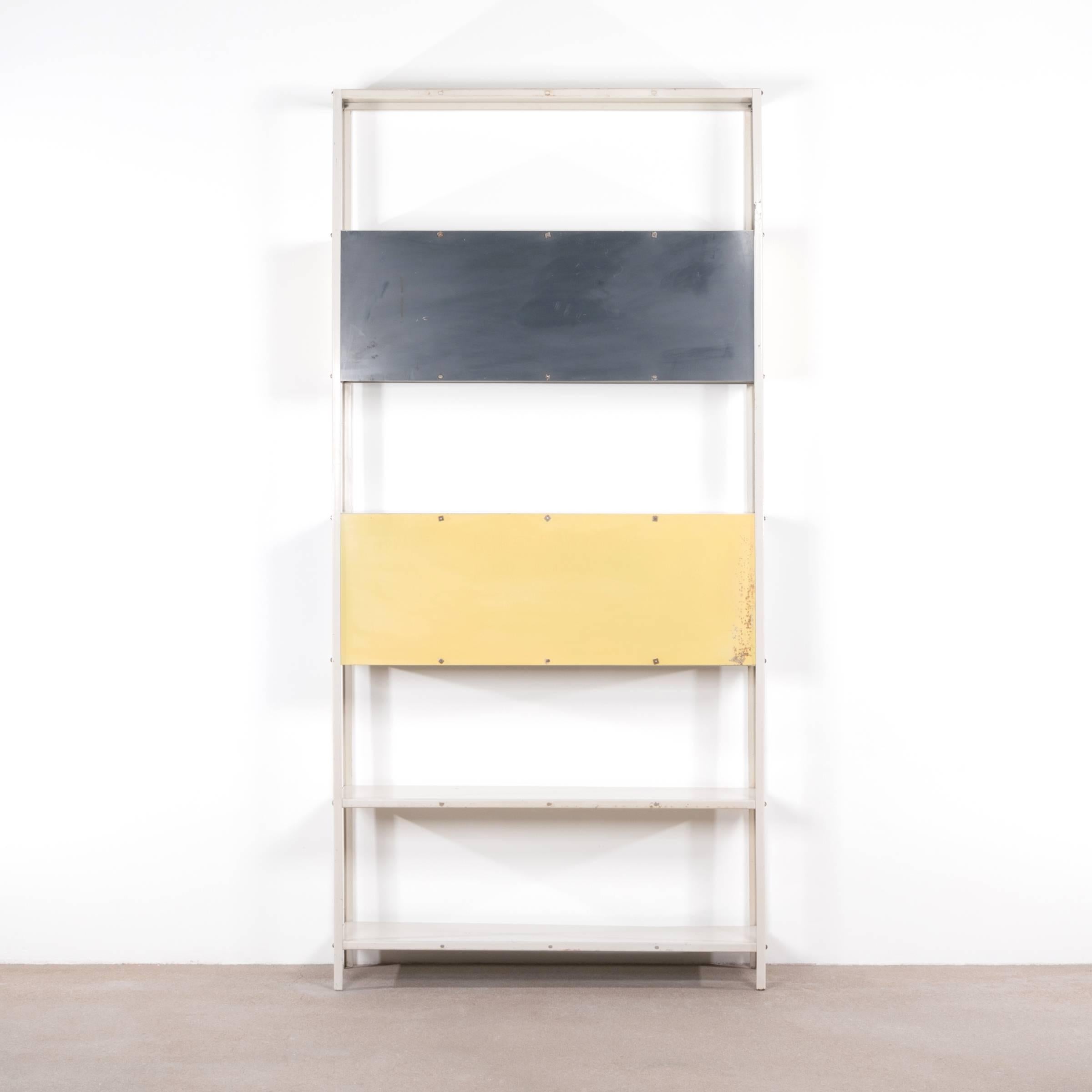 Rare modular bookcase or room divider designed by Friso Kramer in 1953 for 'De Bijenkorf' and produced by Asmeta. 
Good original condition with traces of use.