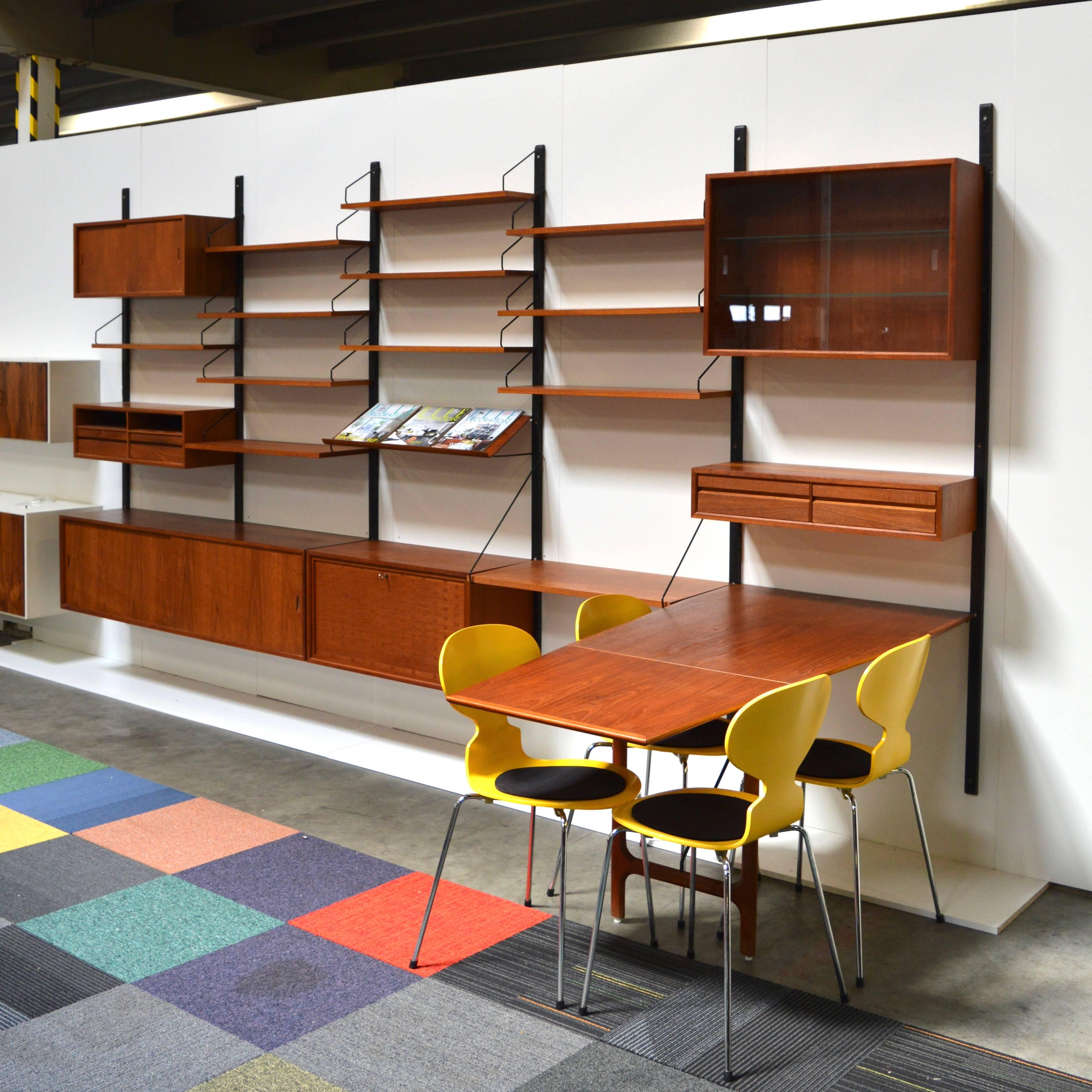 Very exclusive and large Cadovius wall unit. Stunning to see and in beautiful condition. The Cadovius wall units are modular and can be arranged to your own liking. But also extended or split in two or three smaller set ups.

Made of teak with