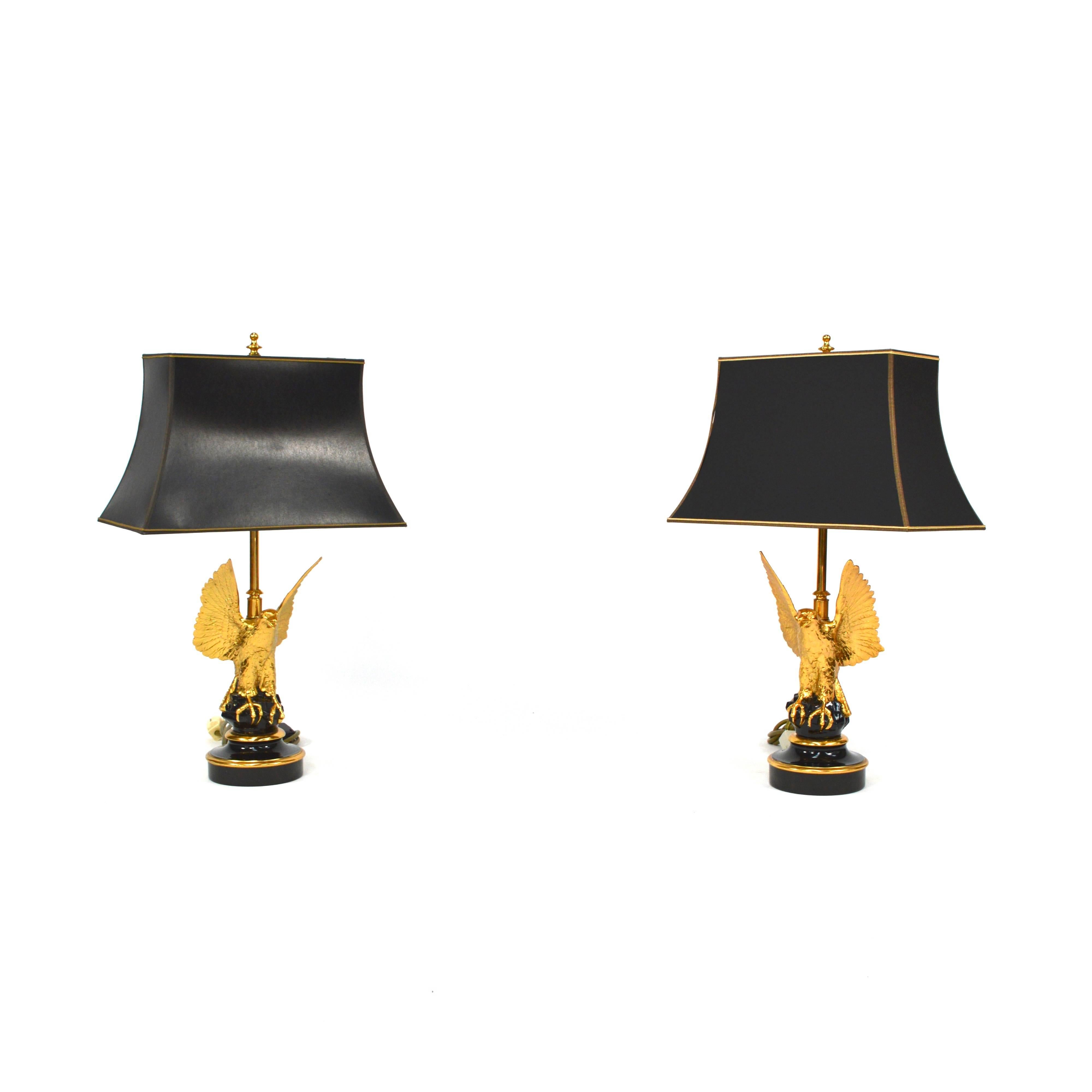 Beautiful pair of gilded eagle table lamps by DeKnudt - Belgium.
The lamps have three light bulbs that can be turned on separate from each other to create a dimming effect.
     