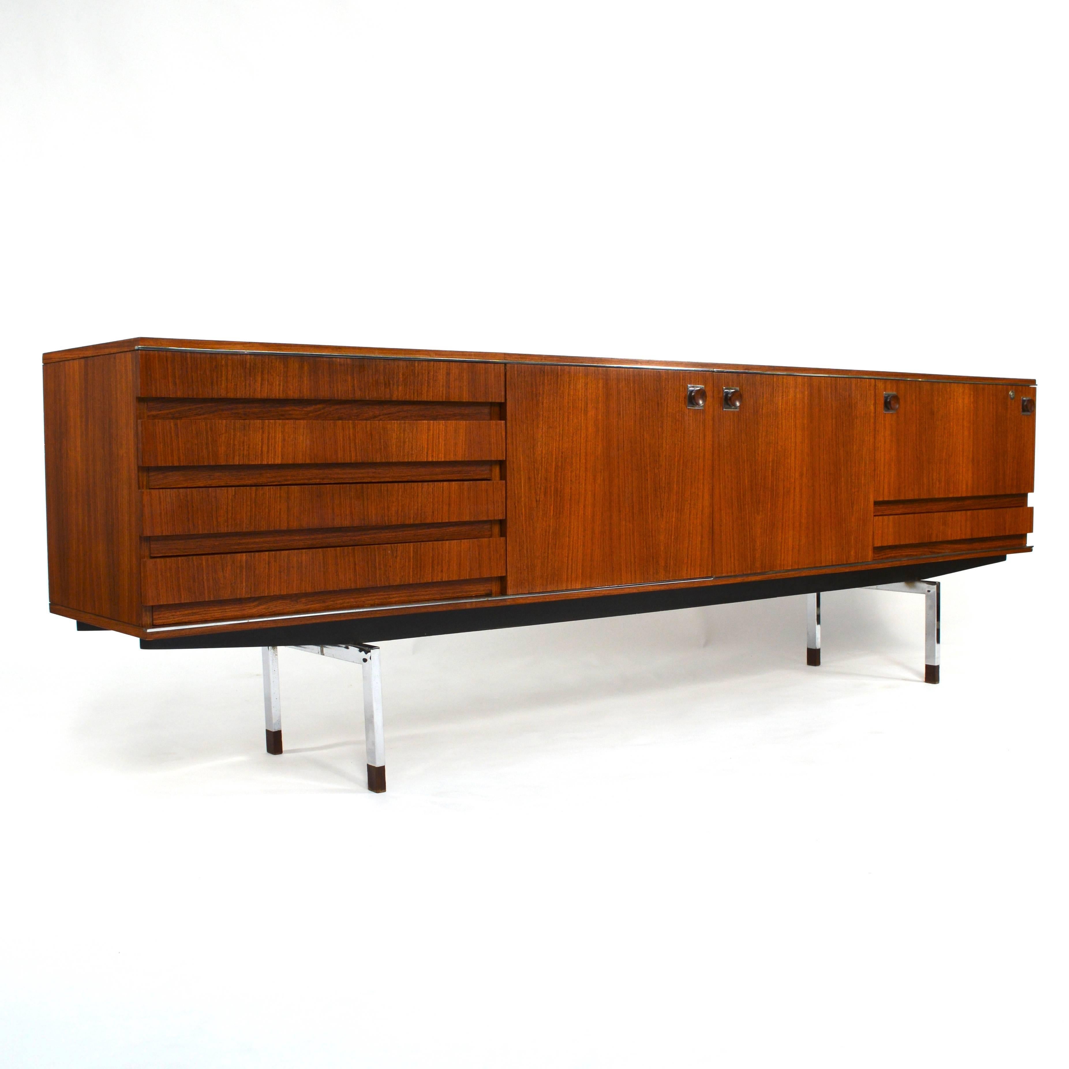 Large teak sideboard by the famous Belgium designer Alfred Hendrickx for Belform. 
Modernistic design with straight lines, beautiful chrome details and warm organic colored teak.
The sideboard is in very good condition with minor signs of use and