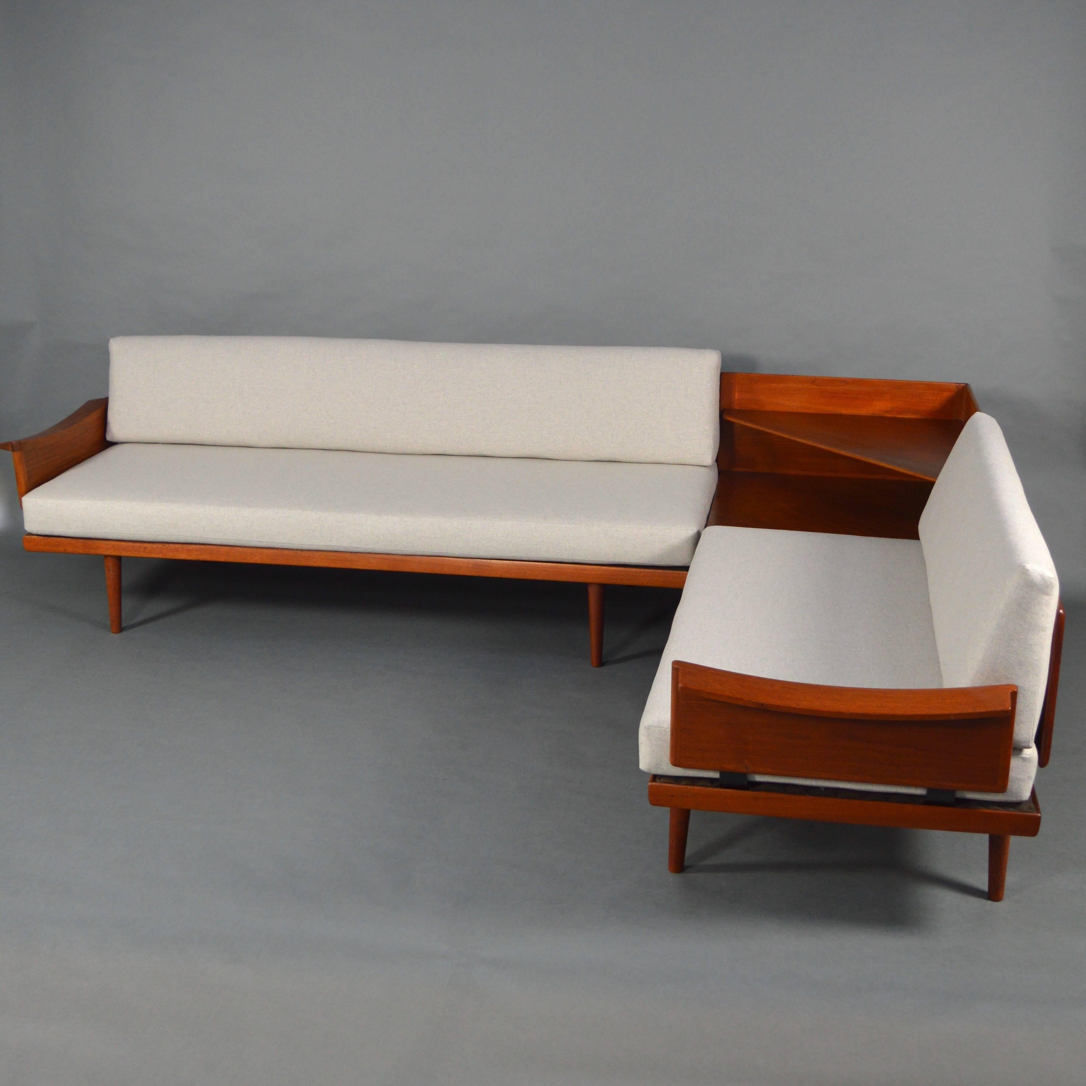 Rare daybed sofa set by Edvard & Tove Kindt larsen for Gustav Bahus, Denmark, 1964.
Made of solid teak and new upholstery in a beautiful light grey mix fabric by Keymer Essential Fabrics.
The armrests can be left or right on the sofa's to create a
