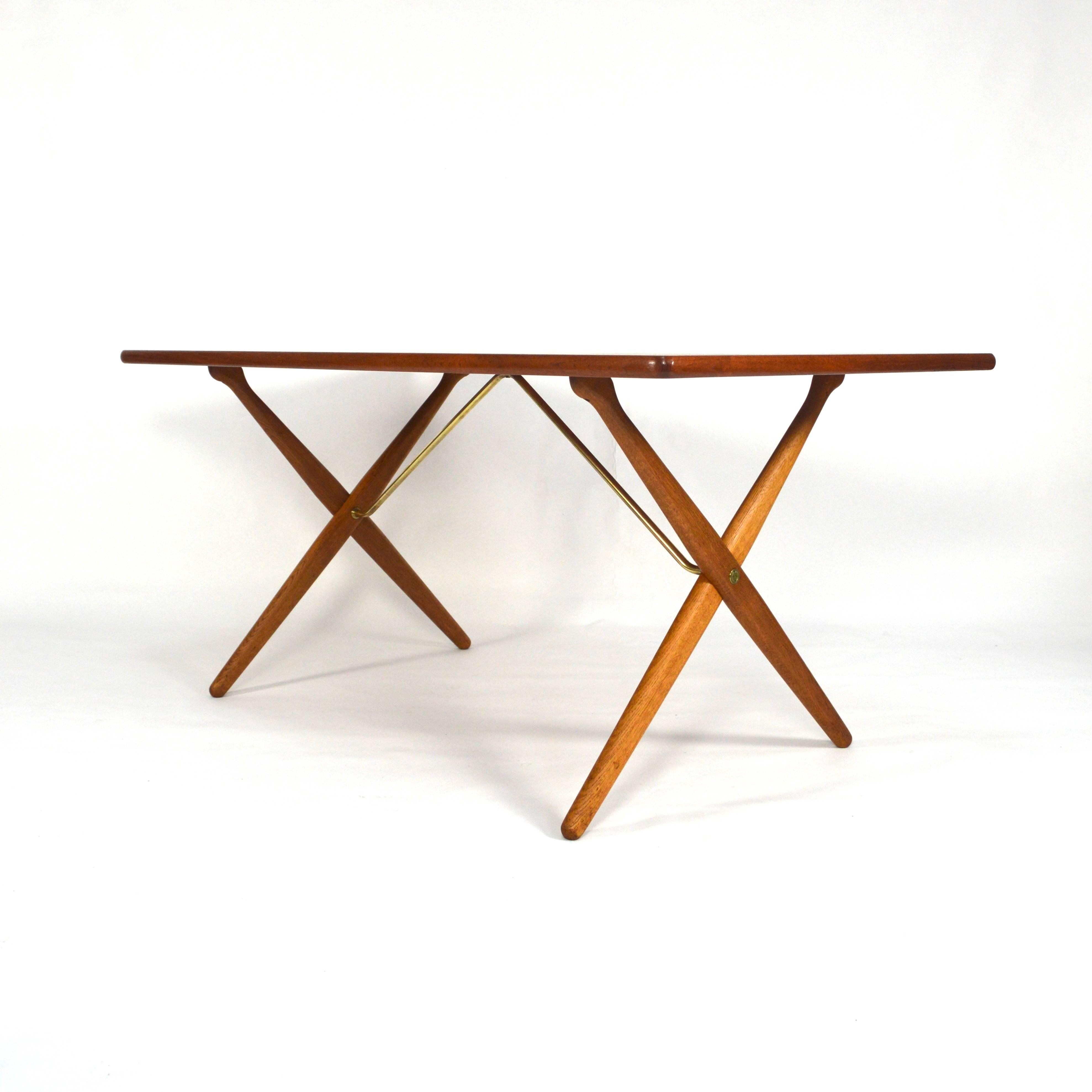 In excellent restored condition.
The table has a teak top and oak legs with brass details.
The chairs are also a combination of teak and oak (backrest and seat are in Teak).
The wood surfaces (tabletop, legs, backrests and seats) have been