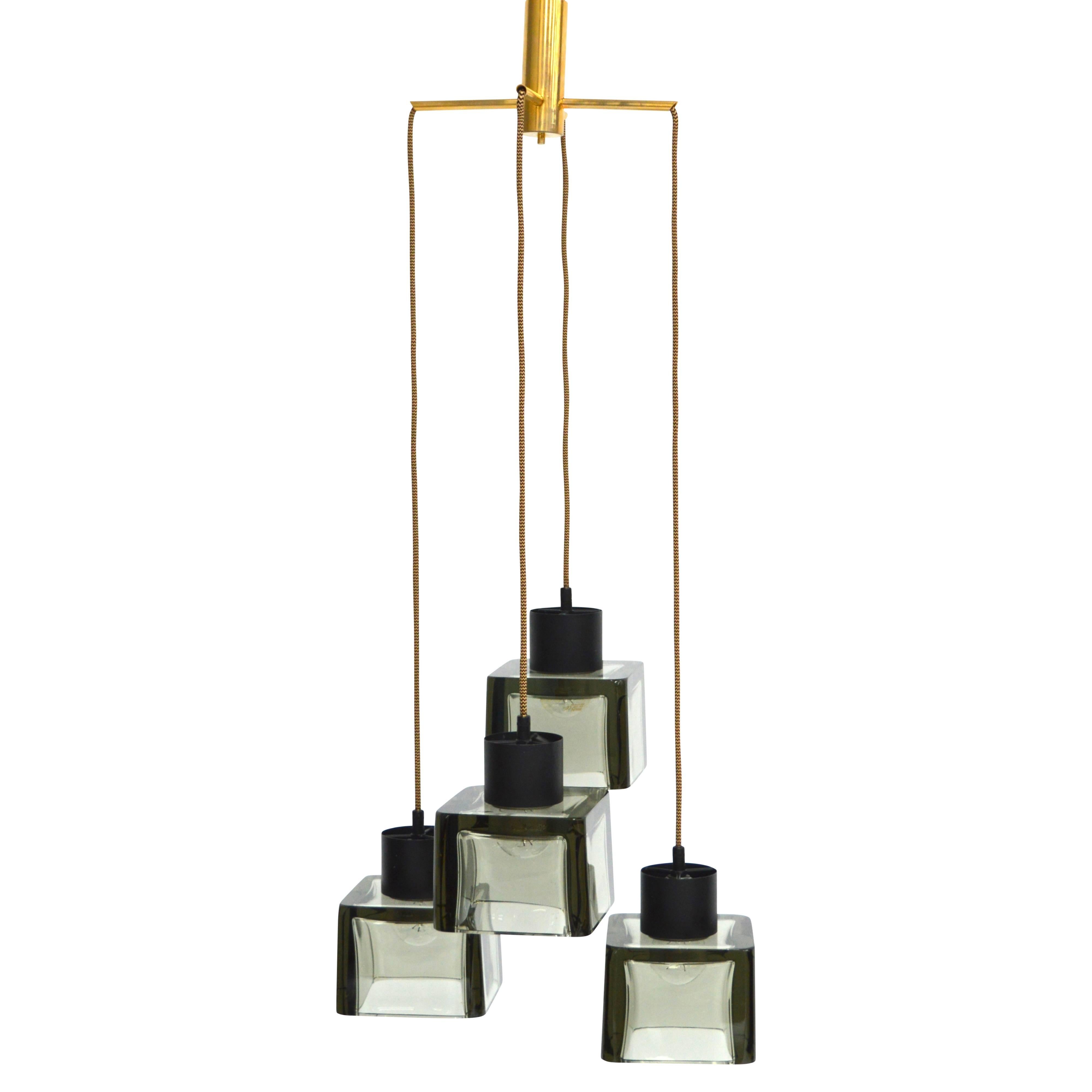 Rare four cube pendant lamp by Flavio Poli for Seguso, Italy, 1950s.
In excellent condition.
The cubes are made of very thick glass which gives an extraordinary effect.
All the wires have been replaced with beautiful new wiring with a gorgeous