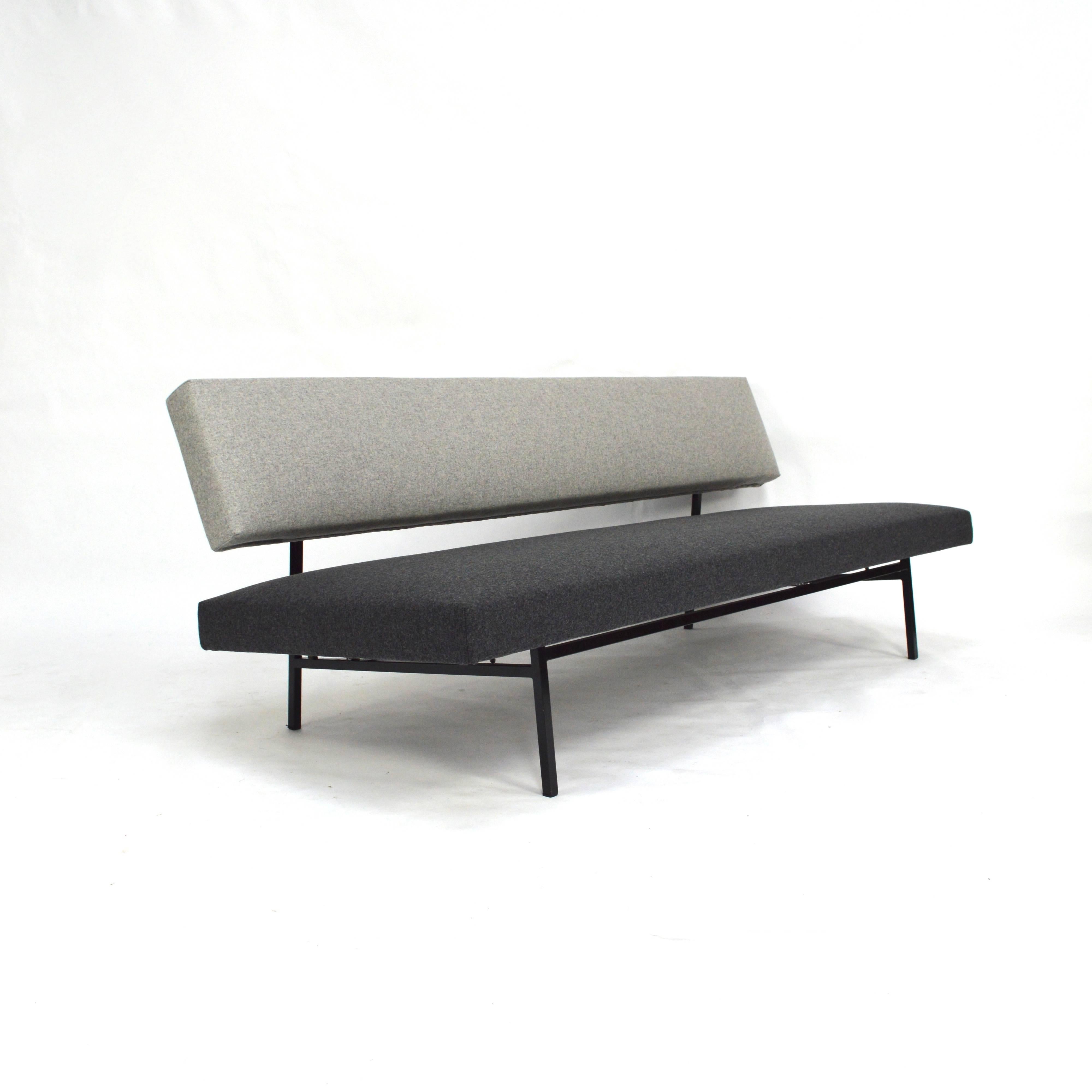 Minimalistic design sofa by Rob Parry for Gelderland. Reupholstered with trendy two-tone felt fabric. The foam interior has also been replaced in both seat and back. The metal base can be professionally re-painted on request.

Parry was a protegé