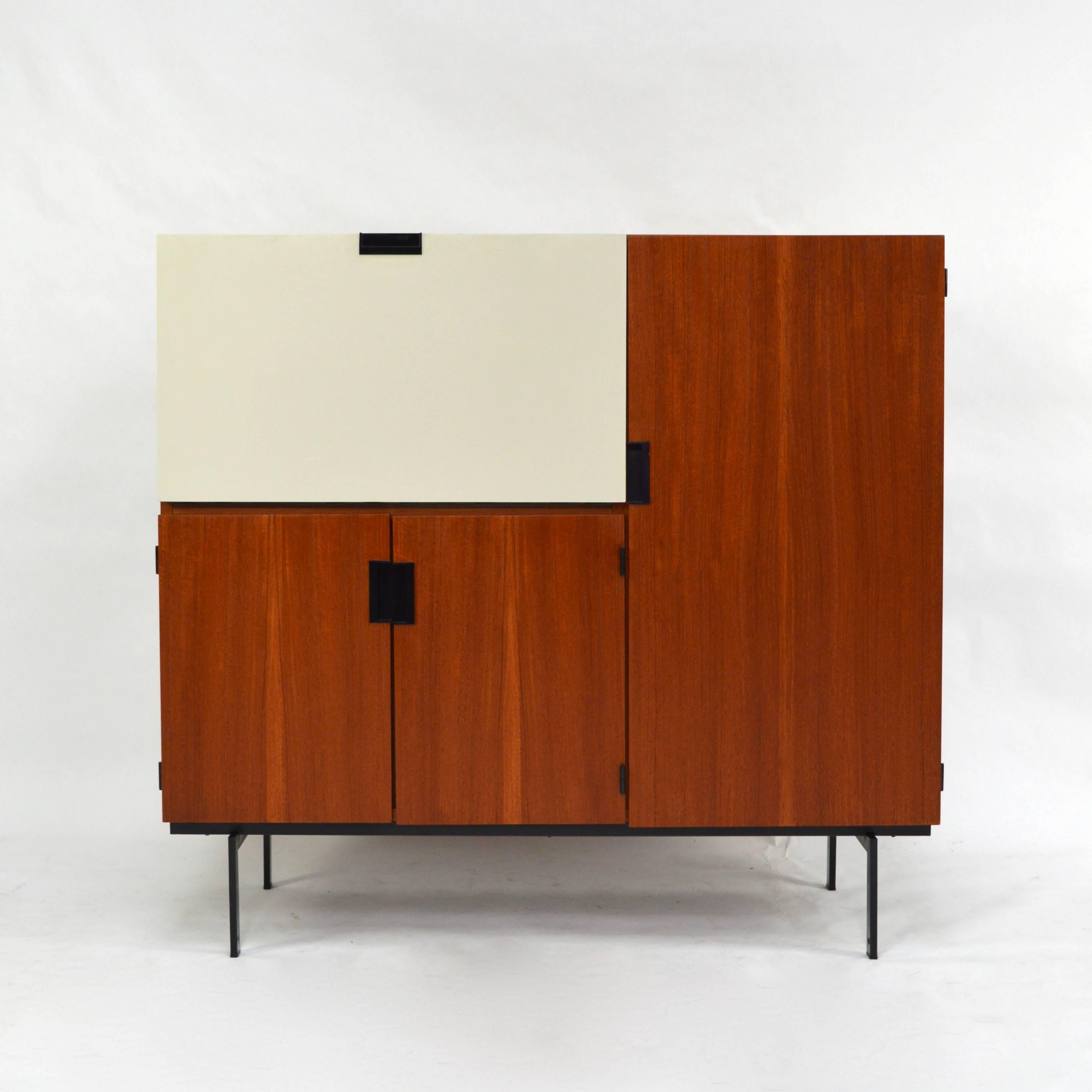 Beautiful CU-06 ‘Japanese Series’ dry bar / cabinet / buffet / desk by Cees Braakman for PASTOE. The interior behind the drop down door can be used as a writing desk or a liquor cabinet. 
The smaller two-drawer cabinet in the photo's does not come