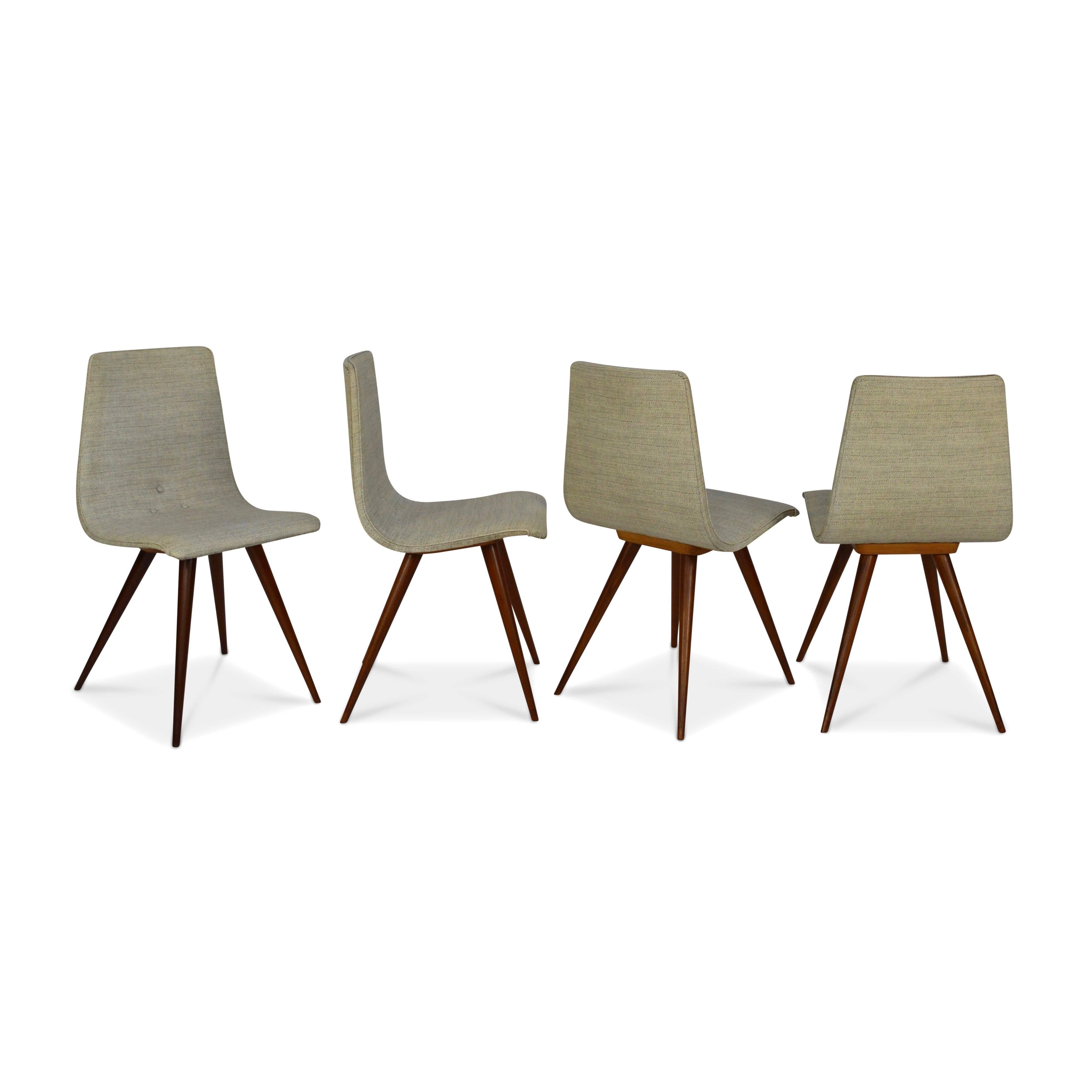 Elegant set of four dining chairs with beautiful solid teak spiderlegs and organic shaped seats. Still completely original.

Designer: Unknown
Manufacturer: Unknown
Country: Netherlands
Model: Dining chairs
Designed in: 1950s
Date of