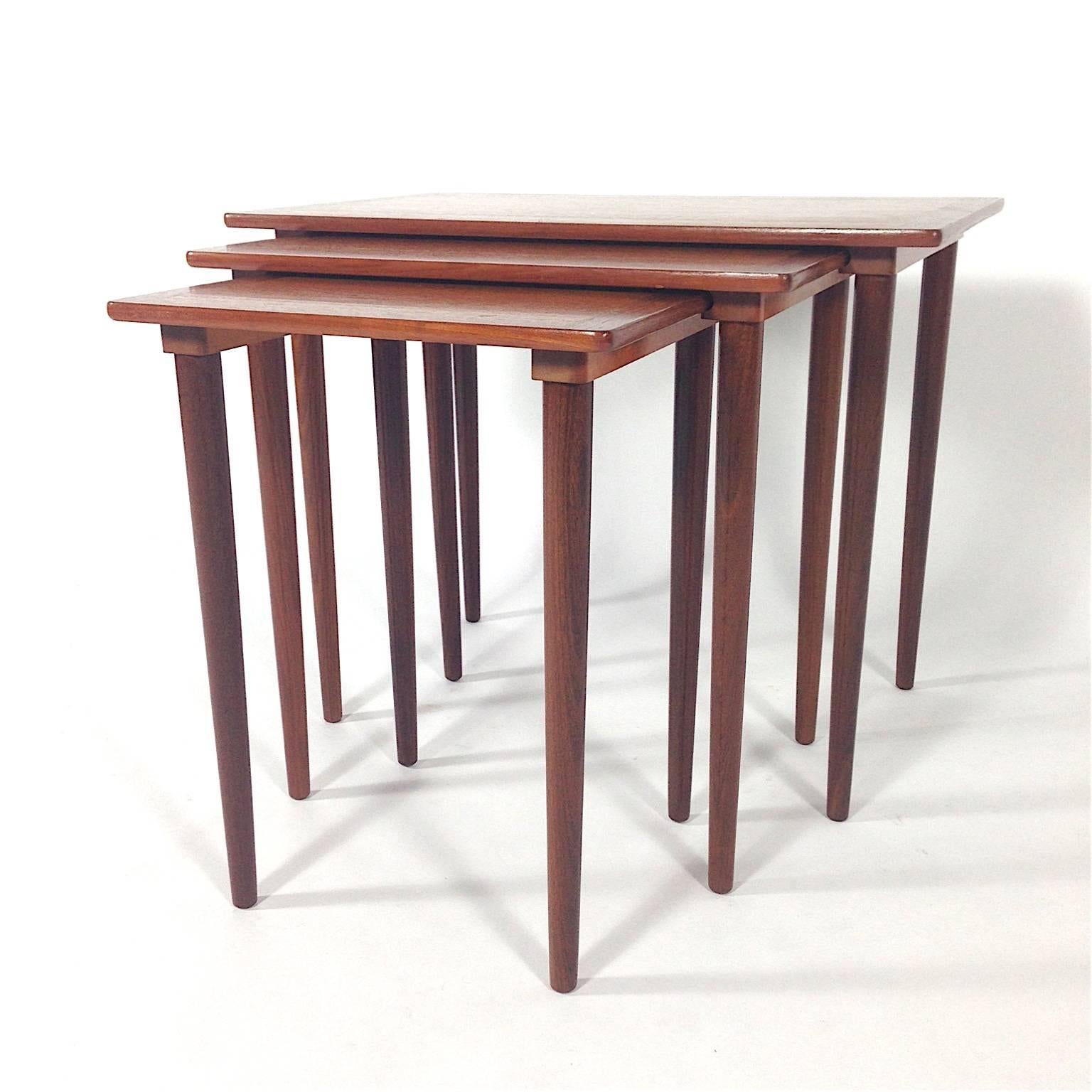 These tables slide into each other and in this way they suspend underneath the biggest table.
They are made of Teak wood and ar in excellent condition with very minor signs of use.
Size of the biggest table: 24.8 x 15.75 x 19.69 inch