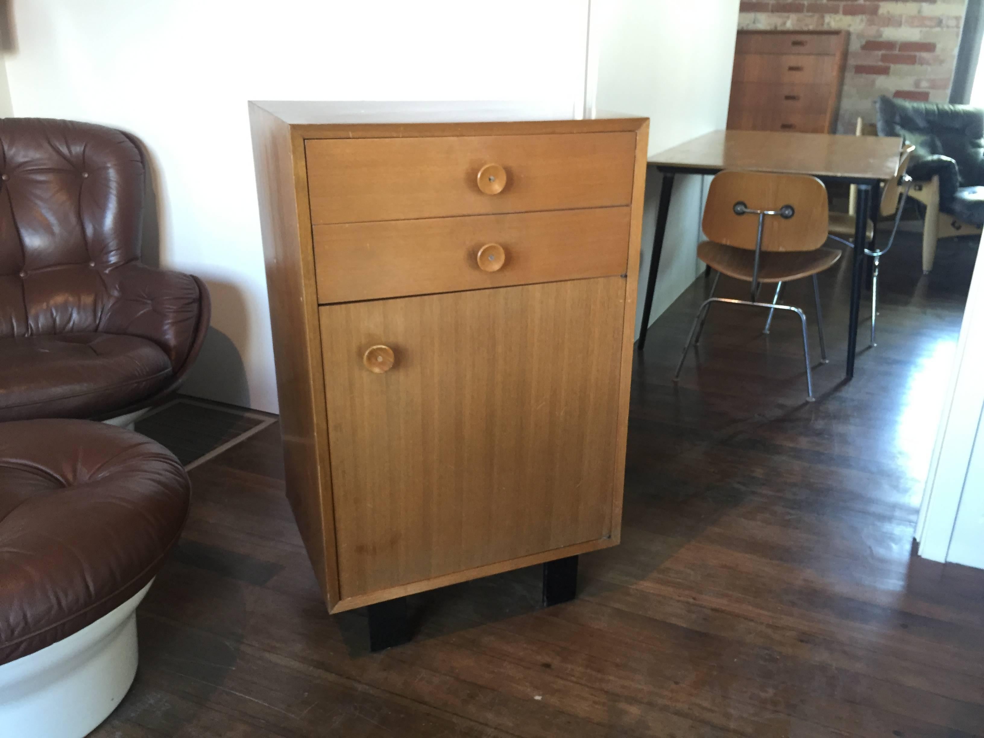 Great storage cabinet by George Nelson for Herman Miller. 
It is in great condition with little wear consistent with age, 
maintains original labels.
     