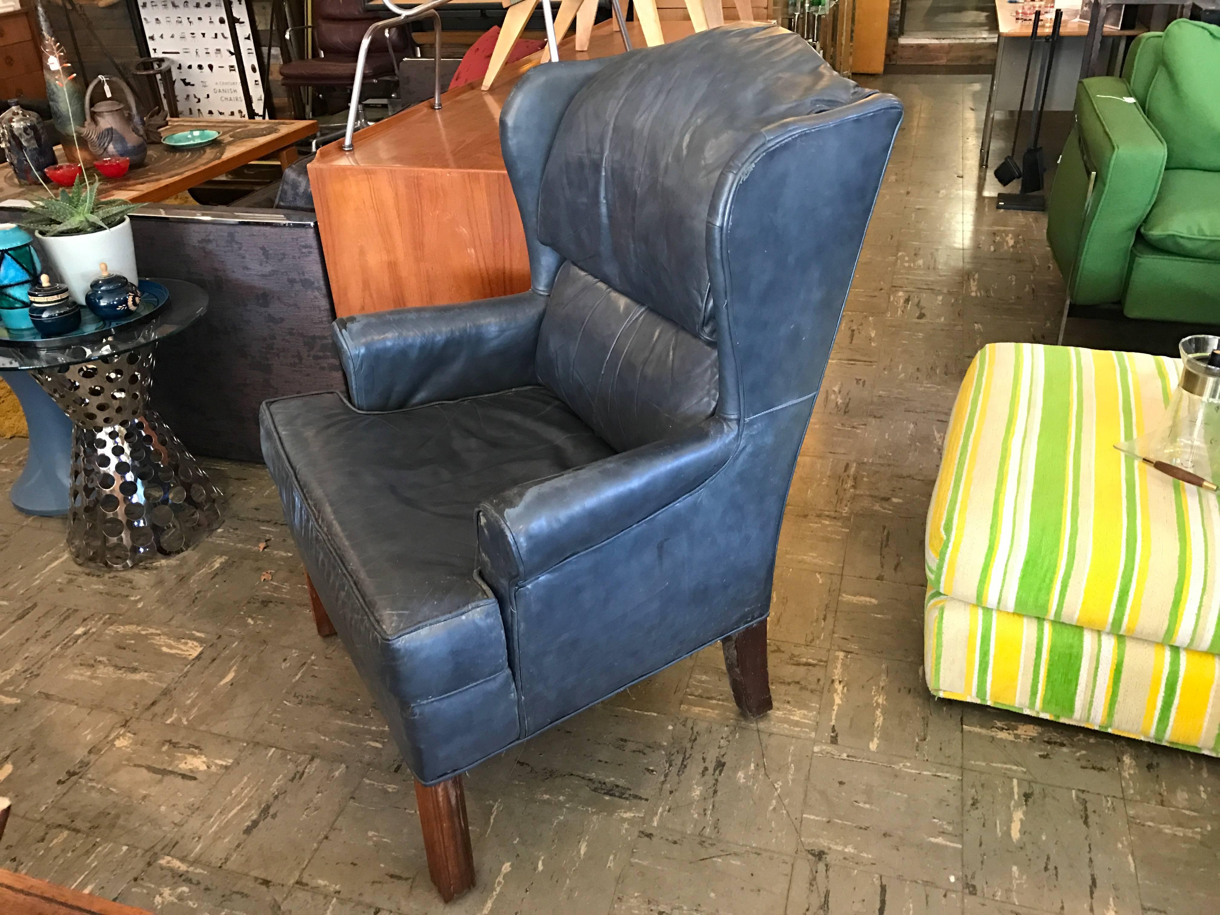 Great patina leather wingback lounge chair.