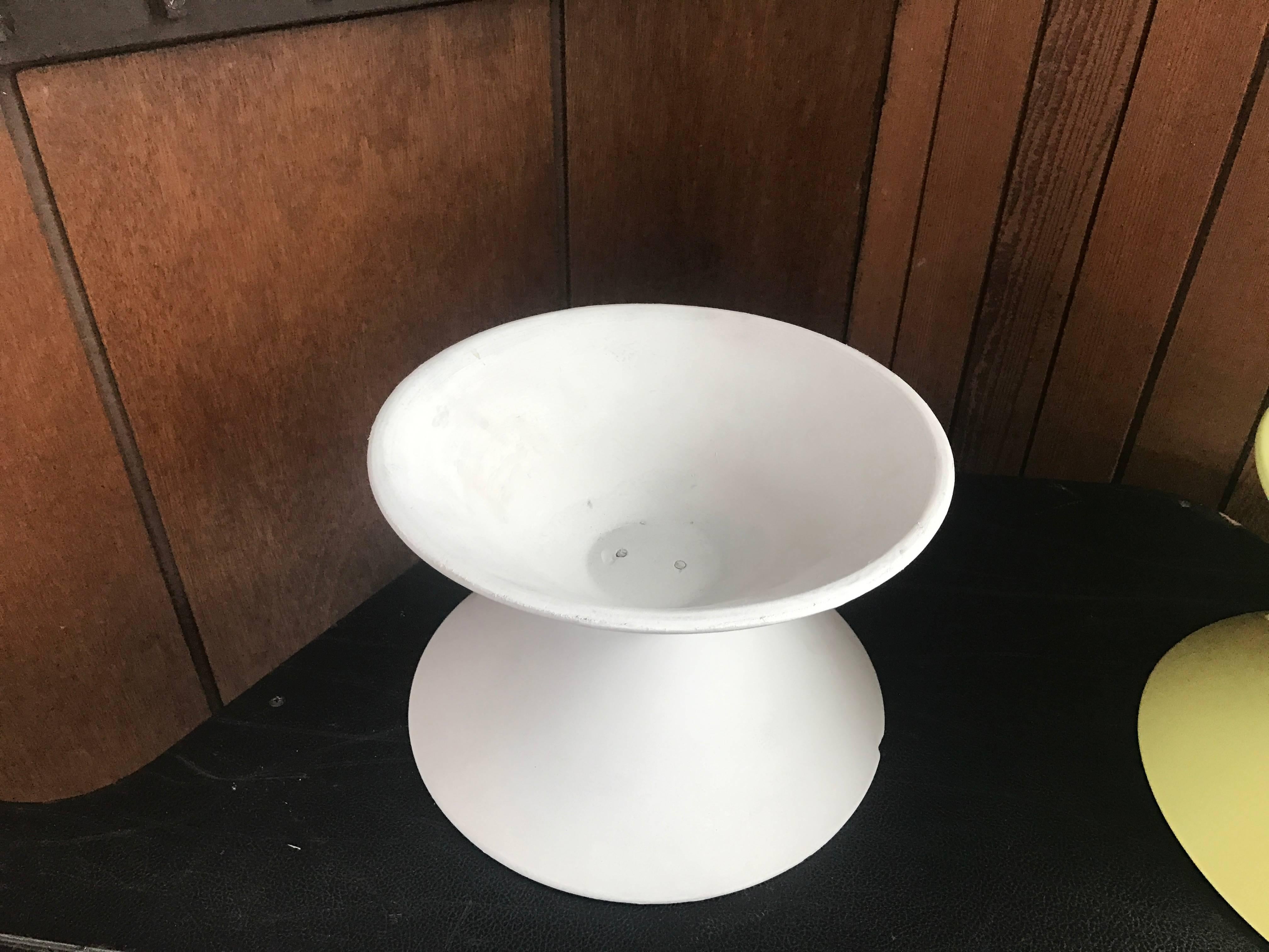 This is a rare double cone planter that looks to have been bisque and painted
still maintains the Architectural pottery stamp
has a chip as seen in photos.