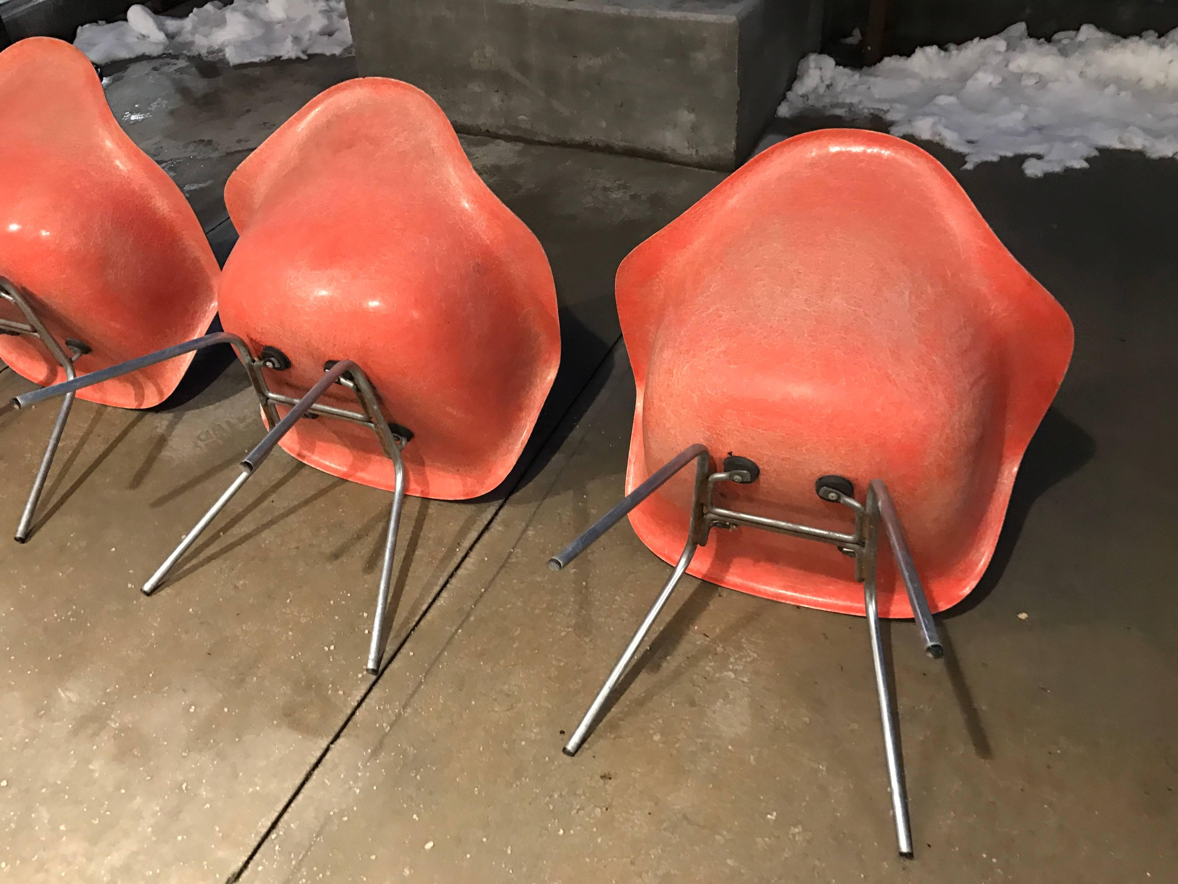 Set of four Eames Salmon Zenith Arm Shell Chairs Herman Miller 1